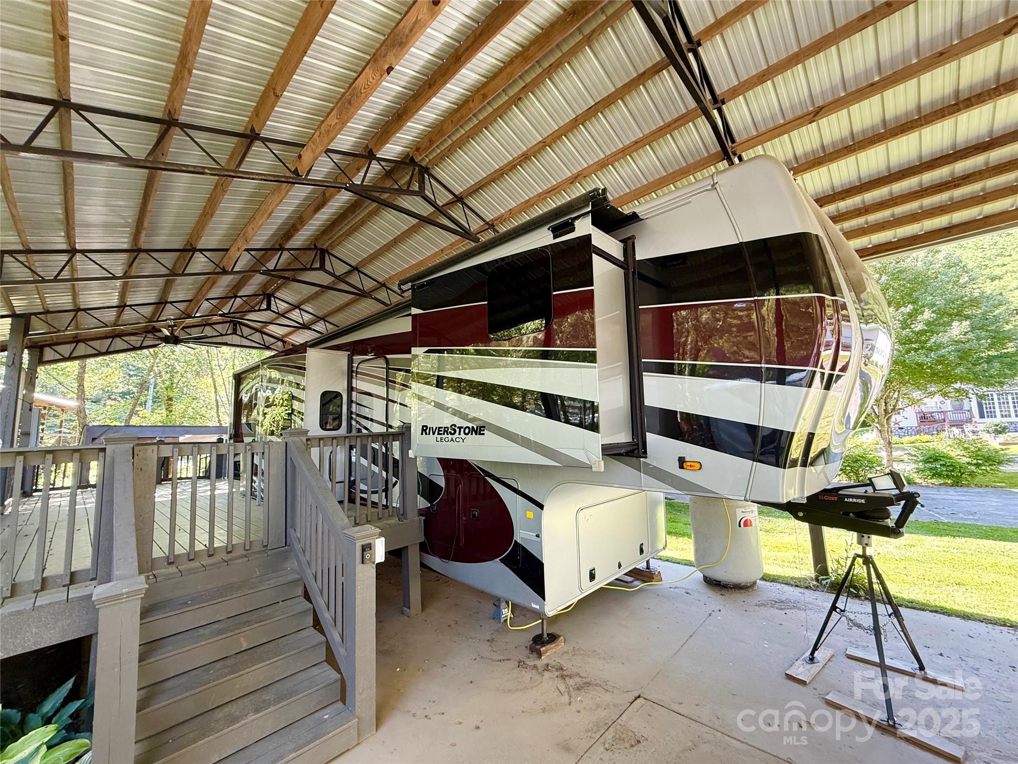 Escape to peaceful creekside living in this beautifully maintained 2022 Riverstone RV, perfectly situated to enjoy nature without sacrificing comfort. This fully furnished 1-bedroom, 1 baths home features an expansive deck overlooking the creek—perfect for morning coffee or evening relaxation. bathroom is complete with a walk-in shower and master bedroom is complete with a king-size bed. Custom decking complete with Enjoy easy access and a shared, well-maintained property complete with a covered carport and a storage building for your convenience. The RV offers a cozy yet functional layout, making it ideal for full-time living or a weekend getaway. Don’t miss this rare opportunity to live in a tranquil setting with modern comforts and beautiful views just outside your door.