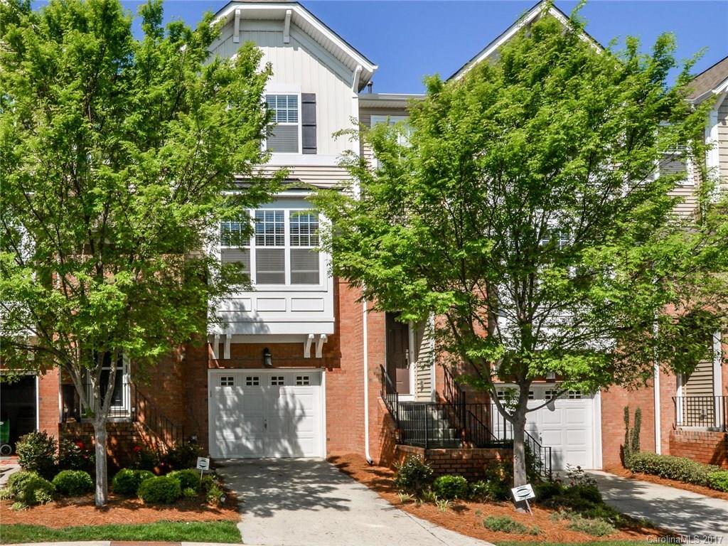 This awesome 3 story Skybrook town home located in Cabarrus Co won't last long! The kitchen features stainless appliances, Granite countertops, tile backsplash, 2 pantries, 42" cabinetry, and pendent lighting! Dining area off the kitchen w/ 4-place breakfast bar under an archway. Entertain in the great room that boasts a gas fireplace and balcony. 3BR and 2BA w/ laundry closet upstairs. Downstairs hosts a large rec room and patio. Finished painted garage!Security system, coverall blinds as well!