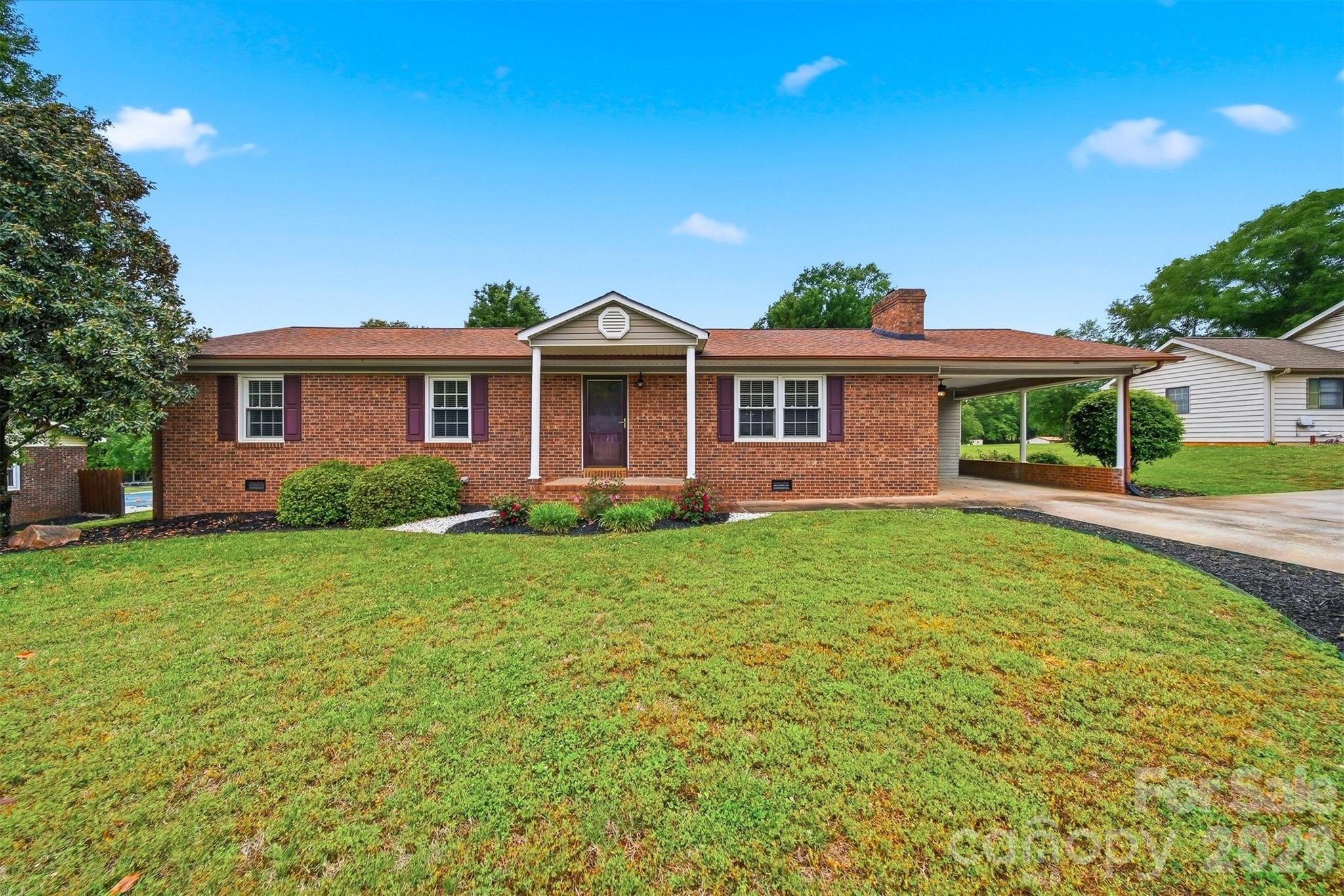 A classic ranch in a highly desirable neighborhood! This well-maintained home offers inviting, light-filled living spaces featuring a cozy fireplace and seamless flow into the dining area, highlighted by glass-pane doors that open to a large deck—perfect for entertaining or relaxing while overlooking the private backyard.

The kitchen is both functional and stylish, complete with an island for added storage and a convenient dining area. The home features 3 spacious bedrooms, 2 full baths, and a generously sized laundry room with an abundance of cabinetry.

Additional highlights include wide plank vinyl flooring, attractive moldings throughout, and a spacious storage building with power and shelving—ideal for hobbies, a workshop, or extra storage.

A perfect blend of comfort, style, and functionality—don’t miss this one!