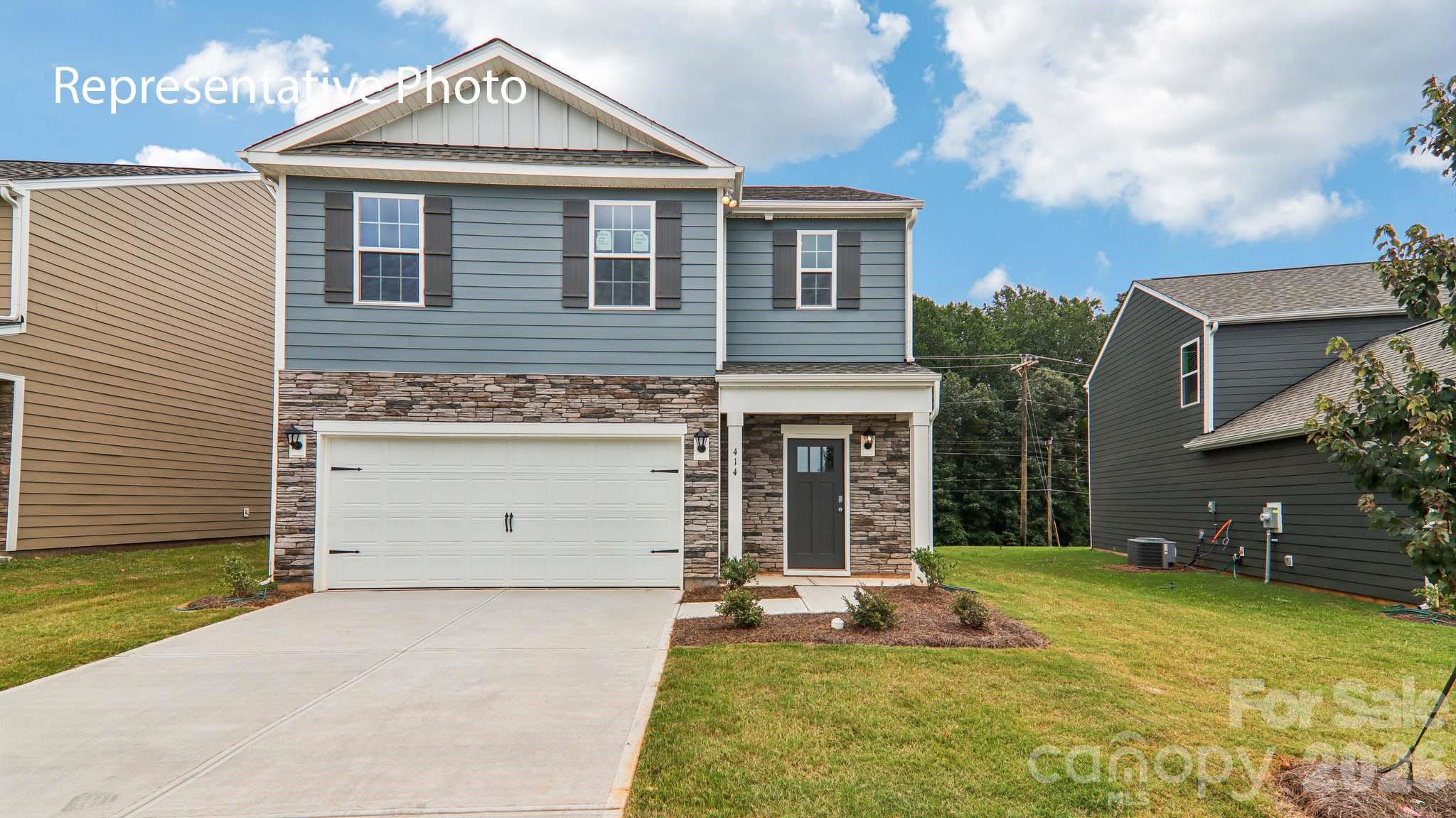 Come tour 1002 Two Brothers Lane located in York, South Carolina!

The Robie is one of our two-story plans featured at Fergus Crossing in York, SC.
This home offers five bedrooms, three bathrooms, and a two-car garage. Upon entering the home, you’ll be greeted by a foyer which invites you in the center of the home. At the heart of the home is a spacious living room and dining room that blends with the kitchen, creating an airy feel. The chef’s kitchen is equipped with modern appliances, ample cabinet space, walk-in pantry, and breakfast bar, perfect for cooking and casual dining. Adjacent to the kitchen is a bedroom, providing privacy and comfort.

The home features a primary suite, complete with a walk-in closet and en suite bathroom featuring a shower with dual vanities. The additional three bathrooms are spacious and have access to a secondary bathroom. The loft offers a flexible space that can be used as a media room, playroom, or home gym. The laundry room completes the second floor.

The Robie is a spacious 2-story home showcasing 5 bedrooms, 3 bathrooms, & 2-car garage. Open floorplan features 1st floor guest suite with full bath, second floor loft area and upstairs laundry room. At the heart of the home is the beautiful kitchen with stainless steel appliances, granite countertops, ample cabinet space, tile backsplash, walk-in pantry and spacious island. Upstairs you will find the large primary suite with walk-in closet, spacious secondary bedrooms with full bath and the laundry room. Community offers pool, cabana, pickle ball, playground and walking trails in sought after location, close to Rock Hill and Fort Mill conveniences. 

With its thoughtful design, spacious layout, and modern conveniences, the Robie is the perfect place for you.
Do not miss this opportunity to make the Robie yours at Fergus Crossing in York, SC.