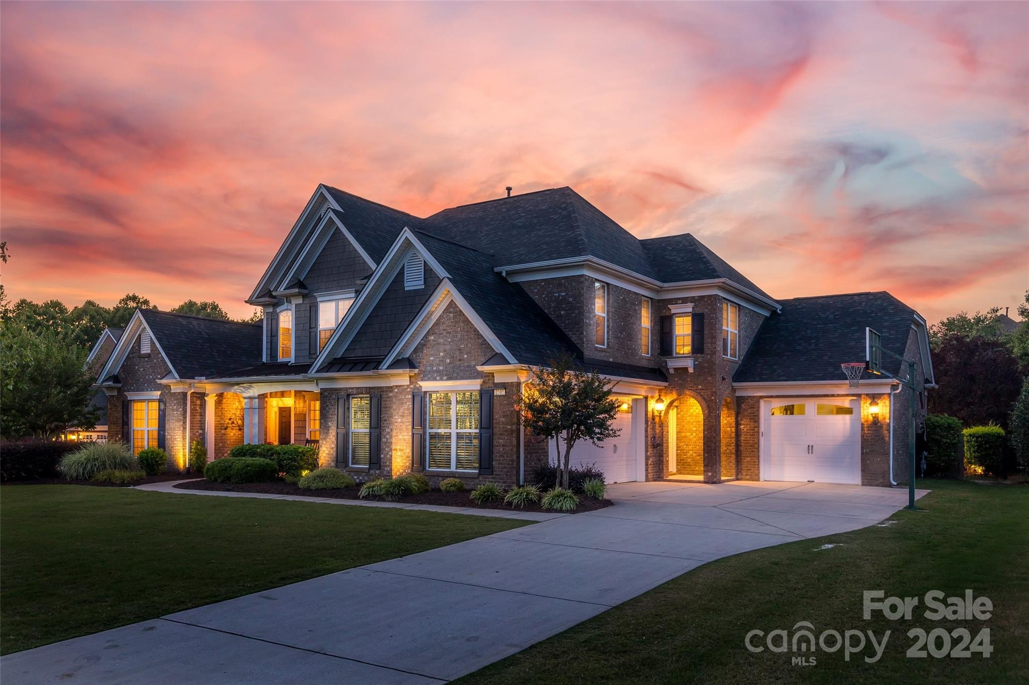You've seen the rest; now, come see the best! This one of a kind, luxury custom homebuilder's personal residence is like no other in the highly sought-after Chimneys of Marvin neighborhood. Located on a premium cul-de-sac lot, this immaculate home offers custom upgrades galore, mostly done in 2023. On the main floor, the sprawling entertaining space will make every day life & holidays an ease. Custom bookcases flank a beautiful natural stone fireplace in the family room that flows into a chef's dream of a kitchen.  Impressive 7.5" wide engineered white oak hardwood flooring lightens/brightens the home. Upstairs, 5 secondary generously-sized bedrooms provide room for all. 1 bedroom is being used as a bonus room. The covered outdoor living space allows you to enjoy the outdoors year round. The built-in grilling station and wood-burning fireplace make this space the perfect spot to enjoy a summer night with your family or comfortably entertain a crowd. New upstairs AC & roof, 2024.