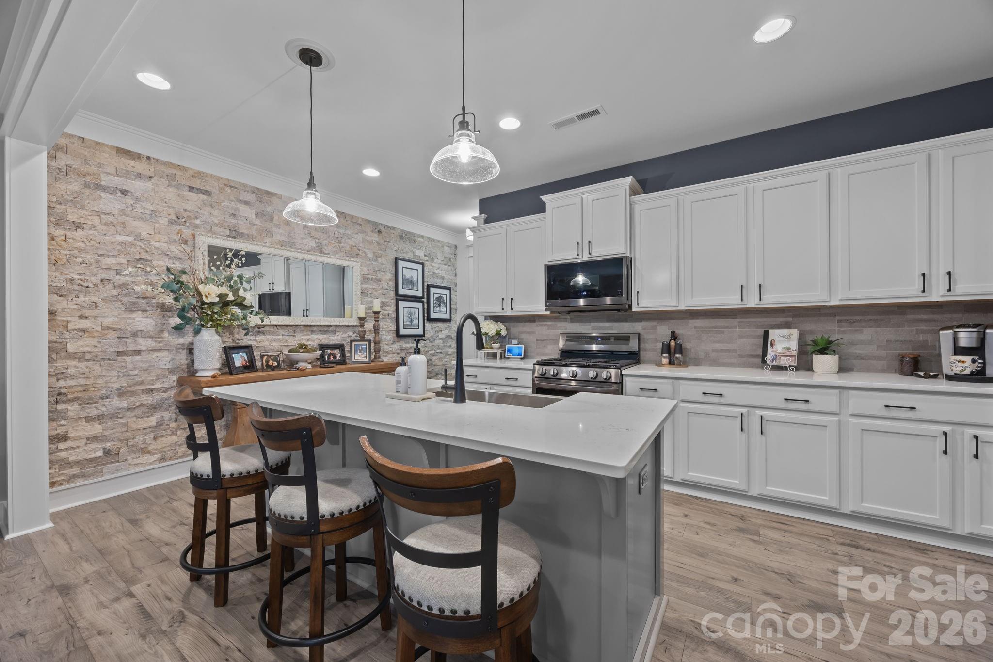 Priced to Sell! Don't miss this beautifully upgraded townhome in the highly desirable Handsmill on Lake Wylie community. Tucked away on a quiet cul-de-sac, this move-in-ready home features stylish custom finishes, quartz countertops, stainless steel appliances, designer accents, and flexible living spaces throughout. The spacious primary suite offers a luxurious updated bath and walk-in closet, while additional living areas provide endless possibilities for work, guests, or recreation.

Enjoy resort-style amenities including lake access, a swimming pool, playground, clubhouse, and scenic surroundings—all just minutes from shopping, dining, and major commuting routes. Low-maintenance living in one of Lake Wylie's most sought-after neighborhoods. Schedule your showing today!
