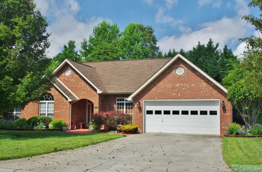 Wonderful brick ranch home on beautifully landscaped lot.  3 Bedrooms & 2 full baths.  Updated kitchen with granite, tile backsplash & ceramic tile flooring. Breakfast area off kitchen & formal dining room as well.  Great room with fireplace.  Fantastic wood floors in dining and great room.  Spacious master bedroom and master bath with dual vanities, separate shower and garden tub.  Huge screened porch off back of home.  Landscaped yard with in-ground irrigation.  Koi pond in yard. 3 car garage.