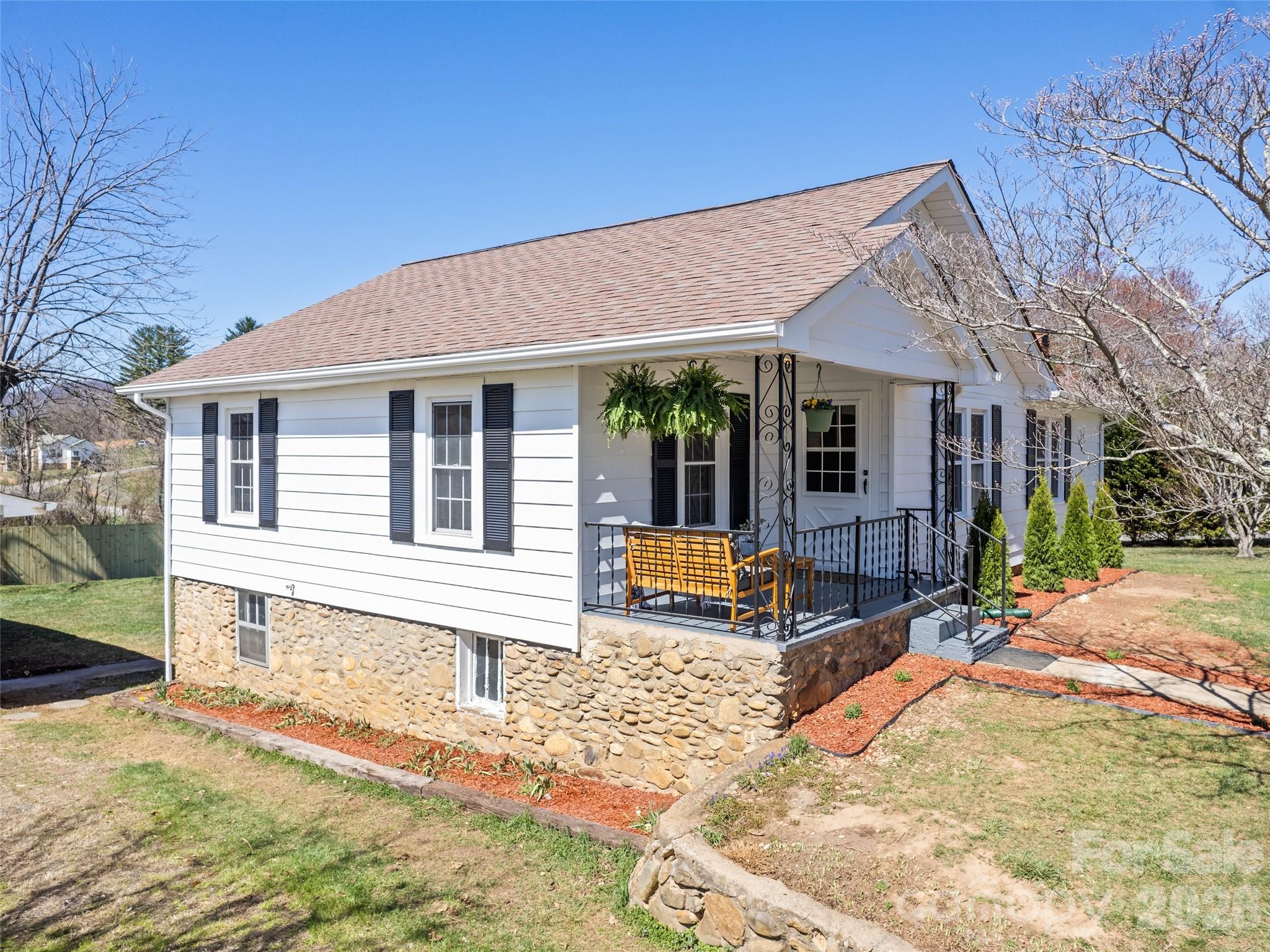 Welcome Home to 157 Morgan Street. Full of character and thoughtfully updated, this charming 3-bedroom home in the heart of Canton offers 1,112 square feet of move-in ready living at $362,000. Built in 1948 and lovingly refreshed throughout, it blends timeless appeal with modern comfort.
Step inside to find gleaming refinished hardwood floors, fresh interior paint, and a bright, welcoming feel in every room. The stylish kitchen is sure to impress with granite countertops and a trendy new backsplash, creating the perfect spot for everyday meals or summer gatherings with friends and family. Behind the scenes, peace of mind comes standard with new appliances, upgraded electrical, a brand new heat pump, and city water and sewer. A pre-sale inspection report is available too, so you can buy with confidence.
Outside, the fun continues. The spacious .41-acre lot has been freshly landscaped, leaving plenty of room to garden, play, or simply relax. A new privacy fence wraps the backyard into a peaceful retreat, and the large west-facing deck, freshly painted, is made for warm evenings and beautiful sunset views. The detached 2-car garage offers new automatic openers plus bonus space for a workshop, hobbies, or storage.
Living in Canton means small-town warmth with everything close by. Enjoy that genuine country feel with no city taxes, all just minutes from shopping, dining, and recreation, with Waynesville and Asheville a short drive away. This is a place with real community spirit, home to the Southeast's longest-running Labor Day Festival, a historic Main Street on the National Register, and easy access to the Blue Ridge Parkway and the Great Smoky Mountains. Hike Shining Rock, cool off at Skinny Dip Falls, or paddle the Pigeon River right through town.
If you're ready to plant roots in a friendly community with adventure at your doorstep, come see what makes this one special. Motivated Seller! Don't let this opportunity pass you by! Offering $2,000 towards a buyers closing costs and a 1 year home warranty!