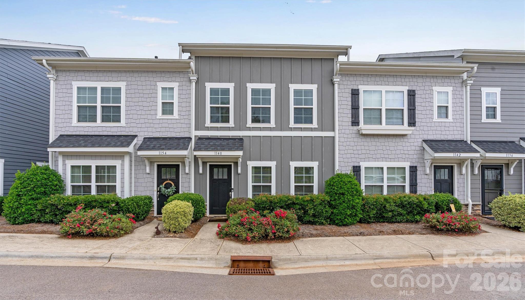 Well-maintained townhouse in desirable Westport Lakeside featuring a primary bedroom on the main level. Open-concept floor plan with kitchen offering granite countertops, large center island, and abundant cabinetry, flowing into the dining area and spacious great room with fireplace—ideal for entertaining. Private backyard patio provides a great space for outdoor living and relaxation. Upstairs features two generously sized bedrooms with walk-in closets and a shared Jack and Jill bath. Feel good knowing there is a home warranty transferrable for one year.  HVAC and plumbing maintained quarterly.  New Nest Thermostat allows you to adjust temperature remotely.  The ring doorbell along with additional garage camera provide extra security.  Located in a sought-after community within walking distance to Westport Tennis Club (membership optional; contact club for details).  Westport Golf Club and Lake Norman Access just up the road.