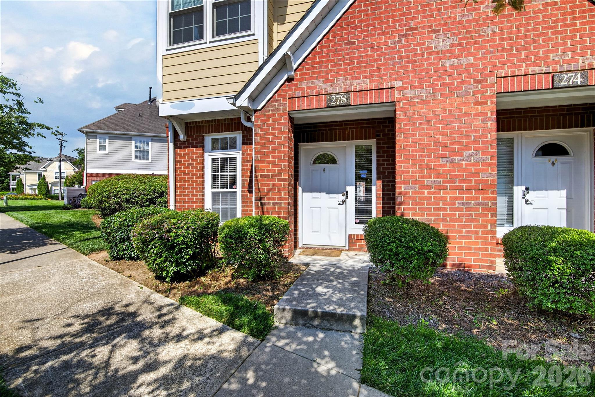 Beautifully maintained 2-story townhome in the heart of Davidson. Light, bright and spacious end unit in impeccable condition. Open and airy layout offers an abundance of natural light. The main level exists of a spacious Kitchen with pantry, Dining Area, Powder Room and Great Room w/fireplace. Door off Great Room leads to an ample sized rear patio to enjoy morning coffee or just a quiet and relaxing time to sit and unwind from a busy day!

The upper level consists of your Primary Bedroom with a luxurious full bath w/shower. A 2nd bedroom with its private full bath is also on this level as well as your Laundry-closet at the top of the stairs. ** Wall lamps in secondary bedroom do not convey **  

Many upgrades have been completed in this well cared for home. Minutes to downtown Davidson, shopping, excellent Dining and Davidson College. Perfect place for any Davidson College student to call home. DON'T MISS THIS BEAUTY!