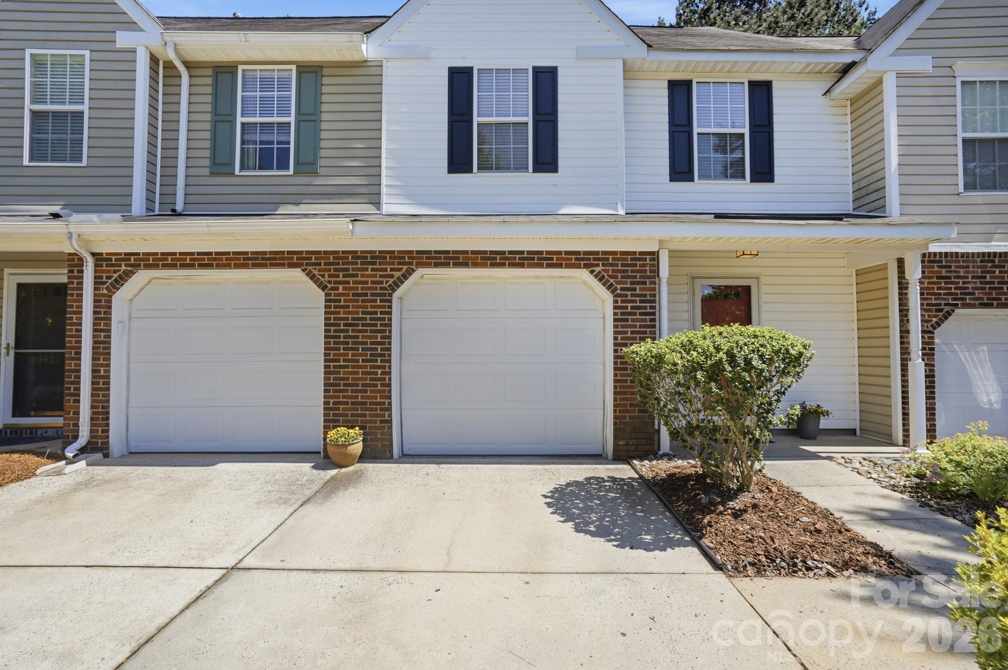 Highly desirable location! Beautifully maintained 2 bedroom 2.5 bath townhome awaits. Comfort, style convenience all in one. First level low maintenance LVP flooring. Kitchen is light and bright with center island overlooking great room with fireplace for ambience. Sunny dining area for everyday living. Upstairs, both bedrooms offer privacy and comfort both with en-suites. Primary has generous sized closet. Both bedrooms have vaulted ceilings.HVAC 2025! Outdoors you will enjoy fully fenced private patio. Owners enjoy access to a community pool and this location places you just minutes from Blakeney, Ballantyne Stonecrest, shopping, 485 and more. One of Charlotte's most sought after areas.  Lock and leave as the yard is maintained for you!. Excellent schools