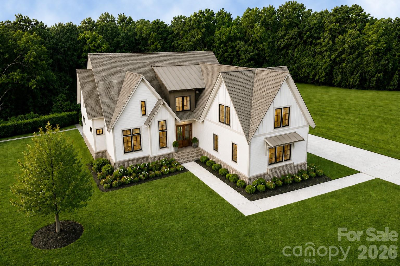 Luxury custom home now nearing completion for September move-in, with the custom cabinetry now being installed, this extraordinary custom home offers buyers the rare opportunity to experience the craftsmanship firsthand. This custom estate home is situated on a private 2+ acre homesite in the prestigious Bella Ridge community. Offering approximately 4,878 heated square feet, this thoughtfully designed luxury residence combines timeless architecture, exceptional craftsmanship, and modern functionality to create a truly remarkable living experience.

Designed for both everyday living and entertaining, the home features 5 spacious bedrooms, 6 full baths, a dedicated media room, bonus room, private office, and an oversized 3-car garage. The open-concept floor plan is anchored by a dramatic vaulted great room with fireplace, flowing seamlessly into a chef-inspired kitchen featuring custom cabinetry, premium appliances, expansive island seating, and generous workspace.

The luxurious main-level primary suite serves as a private retreat, offering a spa-inspired bath, oversized walk-in closet, and direct access to the covered rear porch. Spacious secondary bedrooms and thoughtfully designed gathering spaces throughout the home provide exceptional comfort for family and guests alike.

Upstairs, a large bonus room and dedicated media room create the perfect setting for recreation, movie nights, gaming, fitness, or additional entertaining space. Expansive windows throughout the home fill the interior with natural light while showcasing views of the surrounding acreage and natural landscape.

Outdoor living is equally impressive, featuring a covered rear porch with an outdoor gas fireplace, providing the ideal space for year-round enjoyment, entertaining, and relaxation. The expansive homesite offers ample room for a future pool, outdoor kitchen, detached garage, sports court, or additional recreational amenities.

Built by one of the Charlotte region's most respected luxury custom home builders, buyers still have a limited opportunity to personalize certain selections and finishes depending upon the stage of construction. The builder's professional design team can assist with cabinetry, countertops, flooring, lighting, tile, paint selections, and other details to help create a home that reflects your personal style.

Bella Ridge is one of Fort Mill's premier estate-home communities, known for its large homesites, luxury custom residences, and peaceful setting. Residents enjoy convenient access to charming Downtown Fort Mill, exceptional dining, boutique shopping, community events, and everyday conveniences.

Outdoor enthusiasts will appreciate being just minutes from the renowned Anne Springs Close Greenway, featuring over 2,100 acres of preserved natural beauty, lakes, trails, horseback riding, recreation facilities, and year-round outdoor activities.

Fort Mill continues to be one of the most sought-after communities in the Carolinas, celebrated for its highly rated schools, exceptional quality of life, strong sense of community, and convenient access to Charlotte, Charlotte Douglas International Airport, and major employment centers.

A rare opportunity to own a luxury custom estate home on 2+ private acres in one of Fort Mill's most desirable communities. Construction is underway with anticipated completion in September.