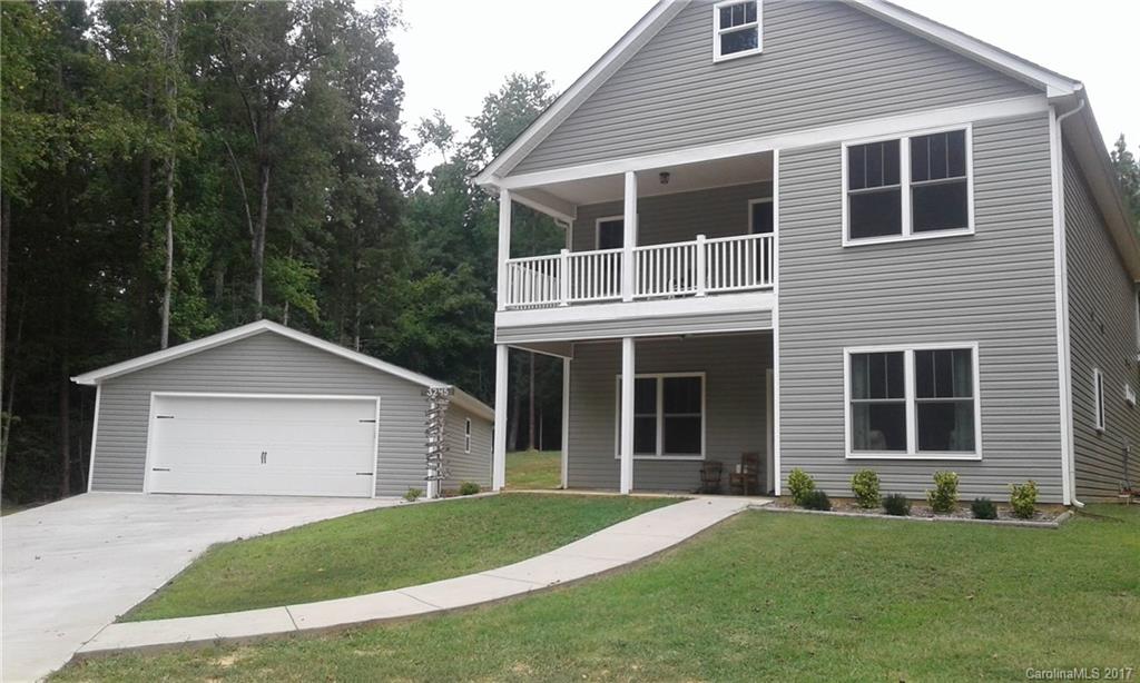 Beautiful modern Charleston style home is move in ready!  Located in a quiet cul-de-sac on a large lot.  Relax out on the front porch and balcony or inside beside the fireplace.  Huge kitchen island is perfect for entertaining! Detached 4 car garage!!