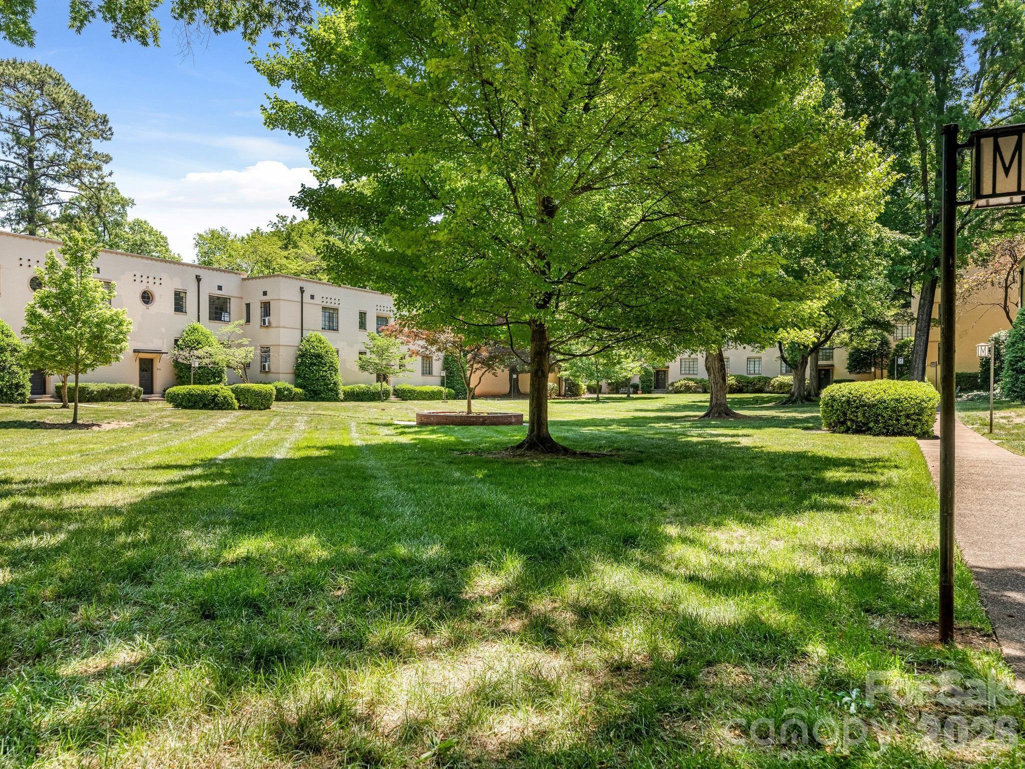 This move-in ready unit is one of the few 2 bedroom units in the Historically Designated Myrtle Square Condos. The approximately 2 acre park-like common area is beautiful with large shade trees. If you want to take a stroll, sit and read a book or enjoy a cup of coffee or a glass of wine, it's right outside your door. The unit is freshly painted and has refinished hardwood floors some of which are new. The full bath and kitchen have tile flooring. Storage is plentiful with 4 large closets. You will sleep well with the gentle breezes from the new ceiling fans in the bedrooms. This in-town Dilworth location is convenient to uptown, South End, Mid-Town, restaurants, YMCA, BOA Stadium and shopping. This is a very walkable neighborhood. Appliances will be sold in "As-Is" condition. Come take a look!