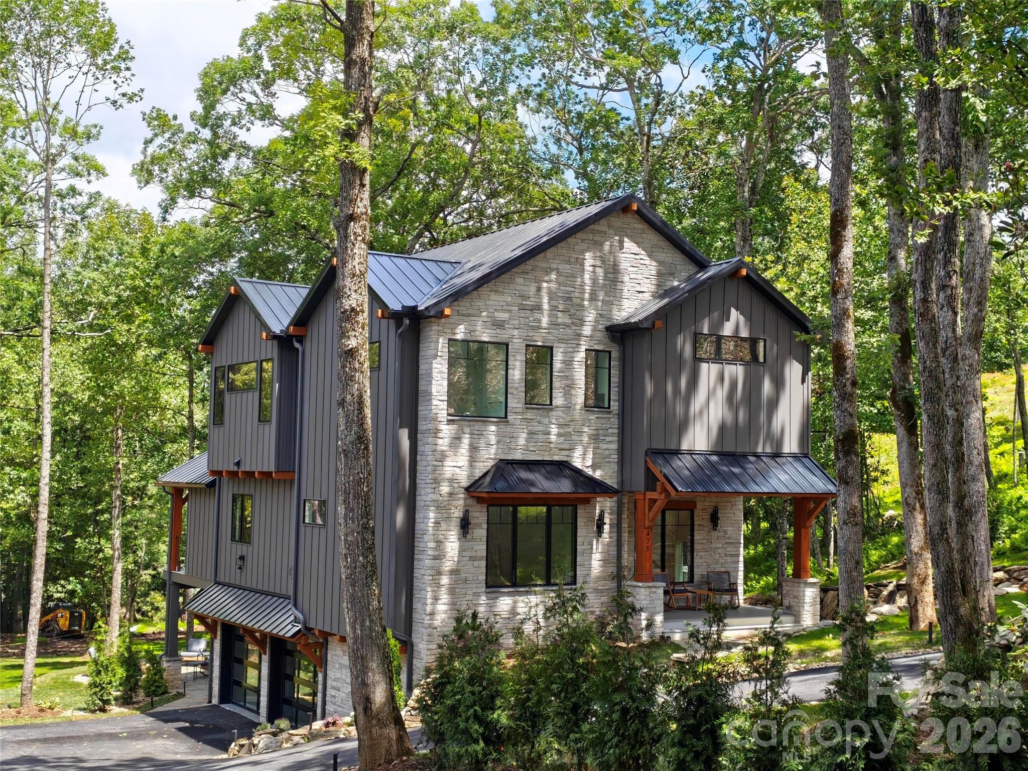 Recently completed in 2026, this impressive three-story home offers approximately 3,200+/- heated square feet of thoughtfully designed living space. Featuring 4 bedrooms, 4 bathrooms, and a 2-car garage, the home also includes the convenience of a private elevator servicing all floors. Built with durability in mind, the property is equipped with a gas generator, metal roof, and metal siding designed for an estimated 45-year lifespan. Combining modern construction, quality materials, and functional design, this home offers comfortable living with long-term peace of mind.