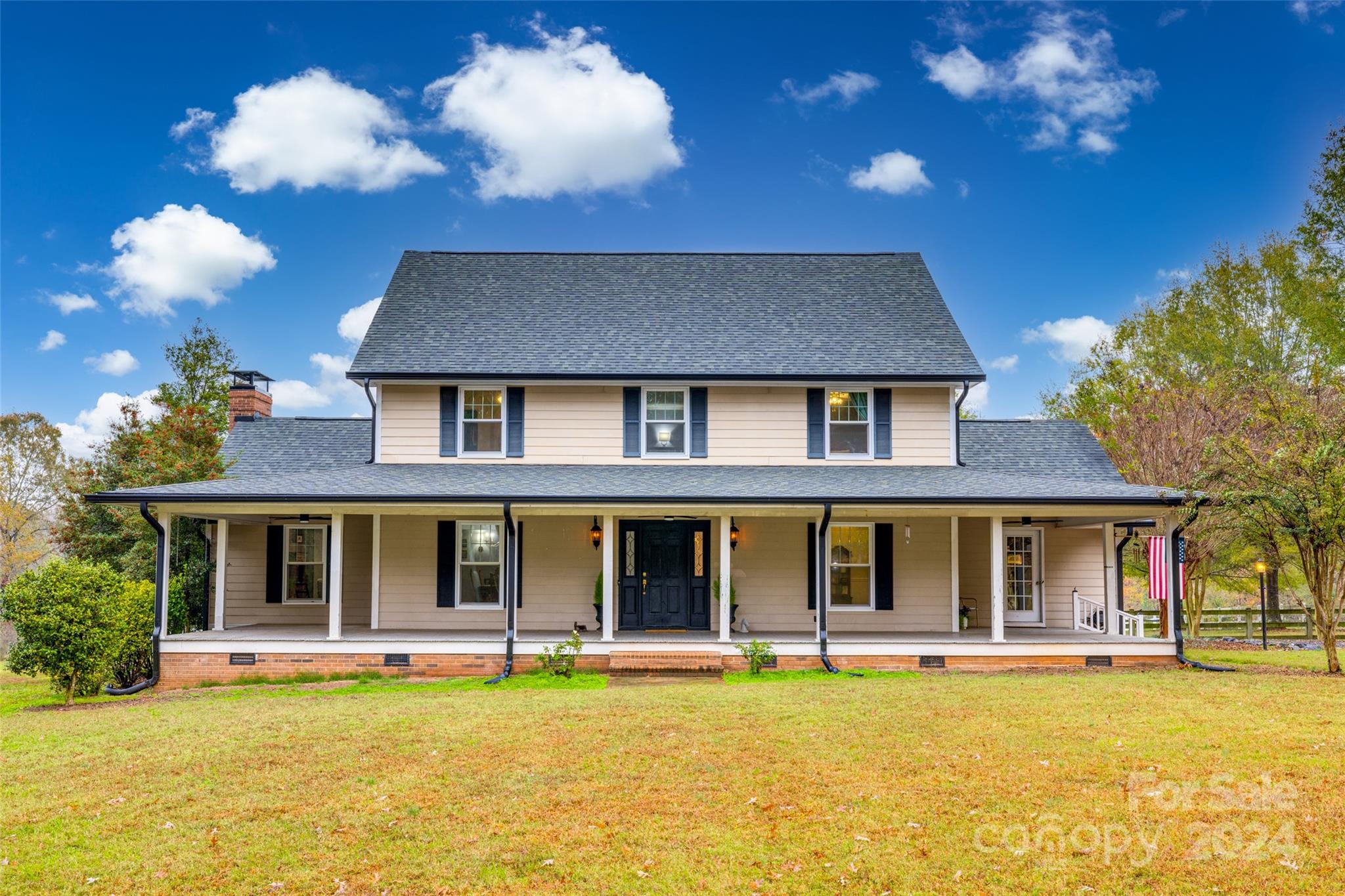 Discover timeless elegance in this beautifully updated farmhouse, nestled on 12.72 picturesque acres with stunning pasture views. This 3-bedroom, 3-bathroom home boasts 3,100 sq ft of meticulously designed living space, featuring site-stained hardwood floors and a remodeled kitchen with GE Café appliances.
The wrap-around porch invites you to relax and enjoy the serenity of the countryside. Inside, you'll find a perfect blend of history and modernity, highlighted by a unique fireplace constructed with bricks from an early 1900s schoolhouse.
Behind the home you'll find a 3-bay garage with room for a horse trailer, RV, or additional storage. An acre of fenced land behind the home provides space for pets or livestock.
Located just 10 minutes from the growing town of Locust, you'll enjoy the peace of rural living with the convenience of nearby shopping and amenities.
Whether you're dreaming of a quiet retreat or a space to host, this farmhouse is ready to welcome you home.