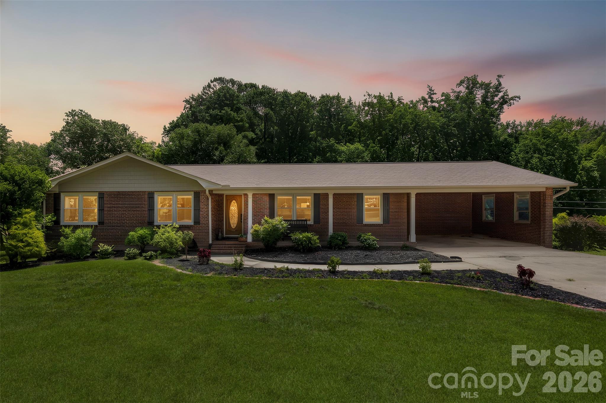 Discover the perfect blend of classic charm and modern convenience in this beautifully updated brick ranch. Situated on a 1-acre lot, this home offers the freedom of no HOA and no city taxes. Step inside to find a sun-drenched floor plan featuring two separate sunrooms that invite the outdoors in. The main level is designed for easy living with a dedicated laundry room and three spacious bedrooms. Need more space? The partially finished basement is a true "bonus," featuring a second kitchen, a large rec room, bonus room and full bathroom ideal for a multi-generational setup, a guest suite, or the ultimate entertainment hub. Outside, the fully fenced backyard provides a secure retreat for pets, play, or gardening. This is a well-loved home, meticulously cared for and ready for its next chapter.