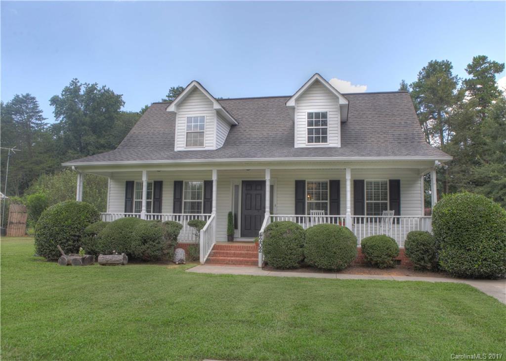 Welcome home! This beautifully well maintained home has 3bd, 2.5ba and sits on a 1/2 acre. Enjoy your huge rocking chair front porch or the privacy of your backyard from the deck. The updated kitchen has like new matching SS appliances, granite countertops and tile backsplash. Other upgrades include engineered hardwood floors, granite counters in all bathrooms, Rinnai tankless water heater and upgraded plumbing and light fixtures. Convenient to  schools, restaurants and shopping. Don't miss out!