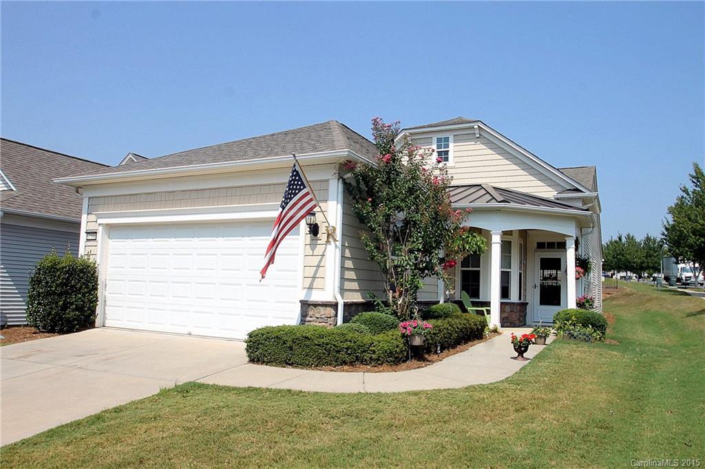 Popular Pine Spring w/ Sunroom & Patio on Corner Lot!  Freshly Painted and Brand New Carpeting Throughout Home! Great Location- Close Proximity to The Lake House, The Golf Clubhouse, & More! Foyer leads to Large Great Room & Formal Dining Area w/ Wainscoting. Kitchen w/ Stainless Steel Appliances, Hardwood Flooring, & Charming Breakfast Nook. Owner’s Suite features Private Bath w/ Dual Sinks, Shower, & Oversized Walk-In Closet. Office Provides Additional Living Space.