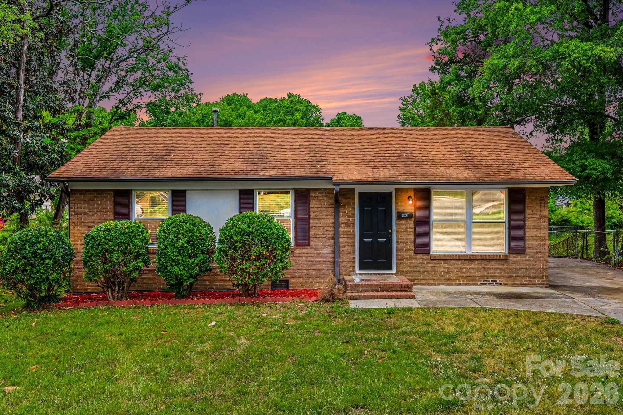 Move-in ready three-bedroom, 1.5-bathroom home located in the established Hidden Valley Estates neighborhood. This residence features an updated kitchen that serves as a functional highlight of the home, complete with granite countertops and sleek stainless steel appliances.
Designed for those who appreciate outdoor space, the property includes a fully fenced-in backyard, providing a private area for gardening or entertaining. The layout offers a classic feel while maintaining a practical flow for everyday living.
This property offers affordability, convenience, and easy access to Uptown, Noda, Plaza Midwood, and surrounding areas. Its central location is ideal for those seeking a short commute to major employment hubs and the vibrant dining and entertainment districts of the city.
Schedule your private showing today!