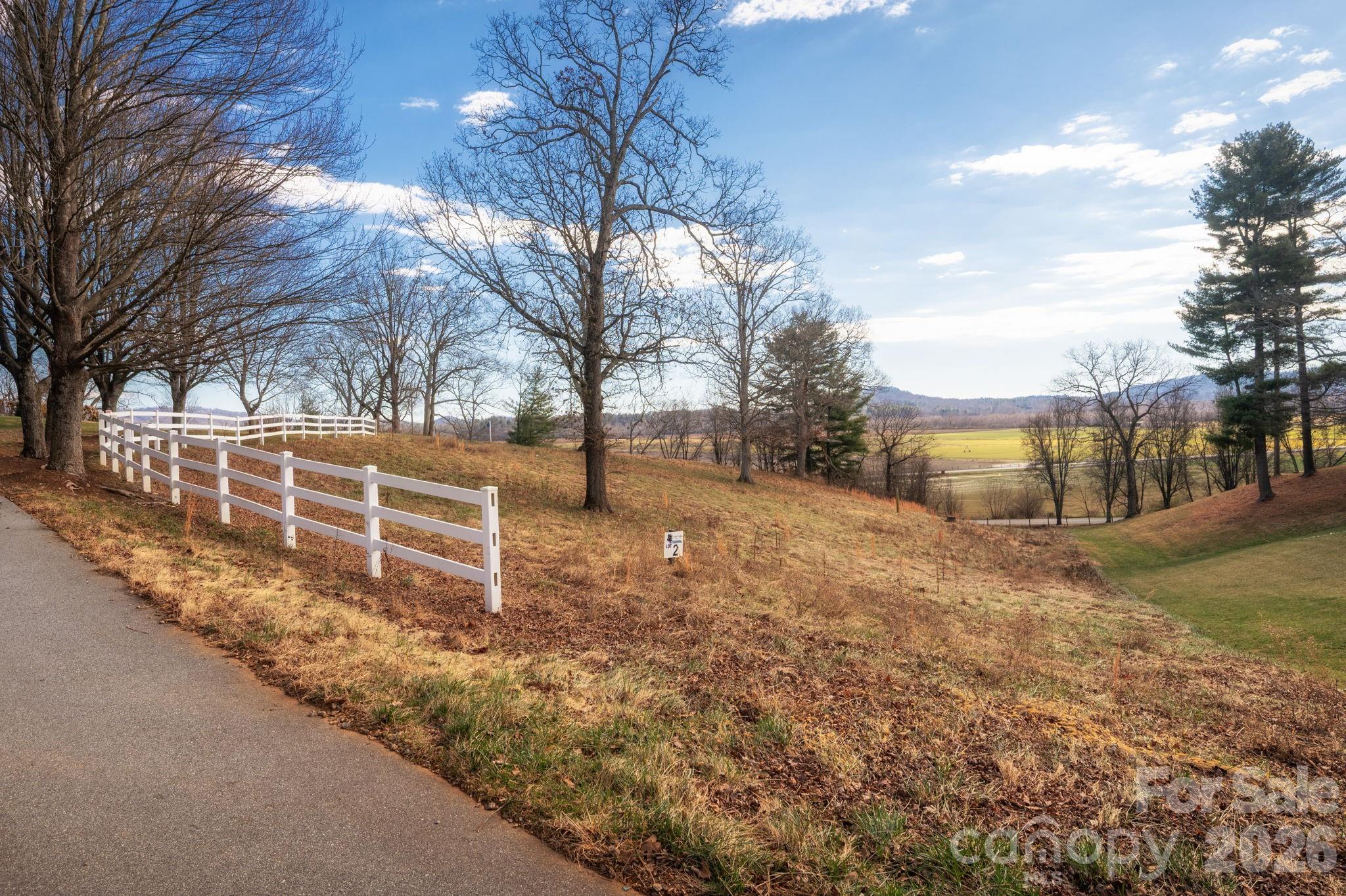 Motivated Seller.  $25k total price reduction.  Welcome to The Farm at Mills River — a thoughtfully designed luxury community where natural beauty, modern conveniences, and a true sense of place come together.  This 1.14-acre homesite stands out as the last of its kind: a rare opportunity to build your dream home on a fully built-out, small quiet cul-de-sac neighboring the original 4200sf estate built in 1938, and situated far away from any active farming with aromatic manure stockpiles — ensuring future privacy, serenity, and freedom from neighboring agricultural practices that may affect lots nearby.  479 Nesbitt Drive homesite is blessed with potential mountain and easterly sunrise views and with a gently sloping mountain topography and easy build site makes it ideal for crafting a custom retreat that seamlessly integrates with the surrounding landscape. Enjoy peace of mind and practicality with city water, sewer, natural gas, and high-speed fiber-optic internet already in place — everything you need for modern mountain living.  The Farm at Mills River combines tranquility and community in perfect balance.  Wide, gently winding roads invite leisurely walks or bike rides, while thoughtfully designed community amenities encourage connection and relaxation.  Features include a fishing and floating pond, small beach/picnic area, a pavilion with a stone fireplace, community garden, and a greenhouse — all designed to foster a sense of belonging and outdoor enjoyment.  With reasonable HOA fees of $100 per month and sensible restrictions to protect your investment, this community provides an exceptional environment for upscale living without unnecessary complications.  Ideally located just minutes from Asheville, Hendersonville, and the Asheville Regional Airport, The Farm at Mills River offers unmatched convenience to top-rated healthcare like Advent Health, shops, and restaurants like Sierra Nevada, Mills River Brewery, Burning Blush, Target, Lowes, Walmart and many more — all while maintaining the serenity of a mountain retreat.  Discover everything you’ve been dreaming of in a modern mountain community that blends sophistication, accessibility, and natural beauty — the perfect place to call home.  This exceptional homesite truly offers something you won't find in the rest of the community or surrounding areas.  Welcome home.