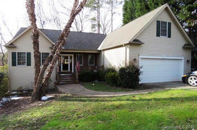 One-level living on the Tega Cay golf course! Spacious bedrooms w/ great open flr plan designed for easy living & entertaining. Fabulous covered porch + lg deck overlook the course & wooded privacy. Hdwd flrs in common areas, tile in baths & carpet in BRs. Huge crawl space could be nice workshop area or future expansion. One year home warranty provided for buyer @ closing. Home priced to sell & to be sold as is.