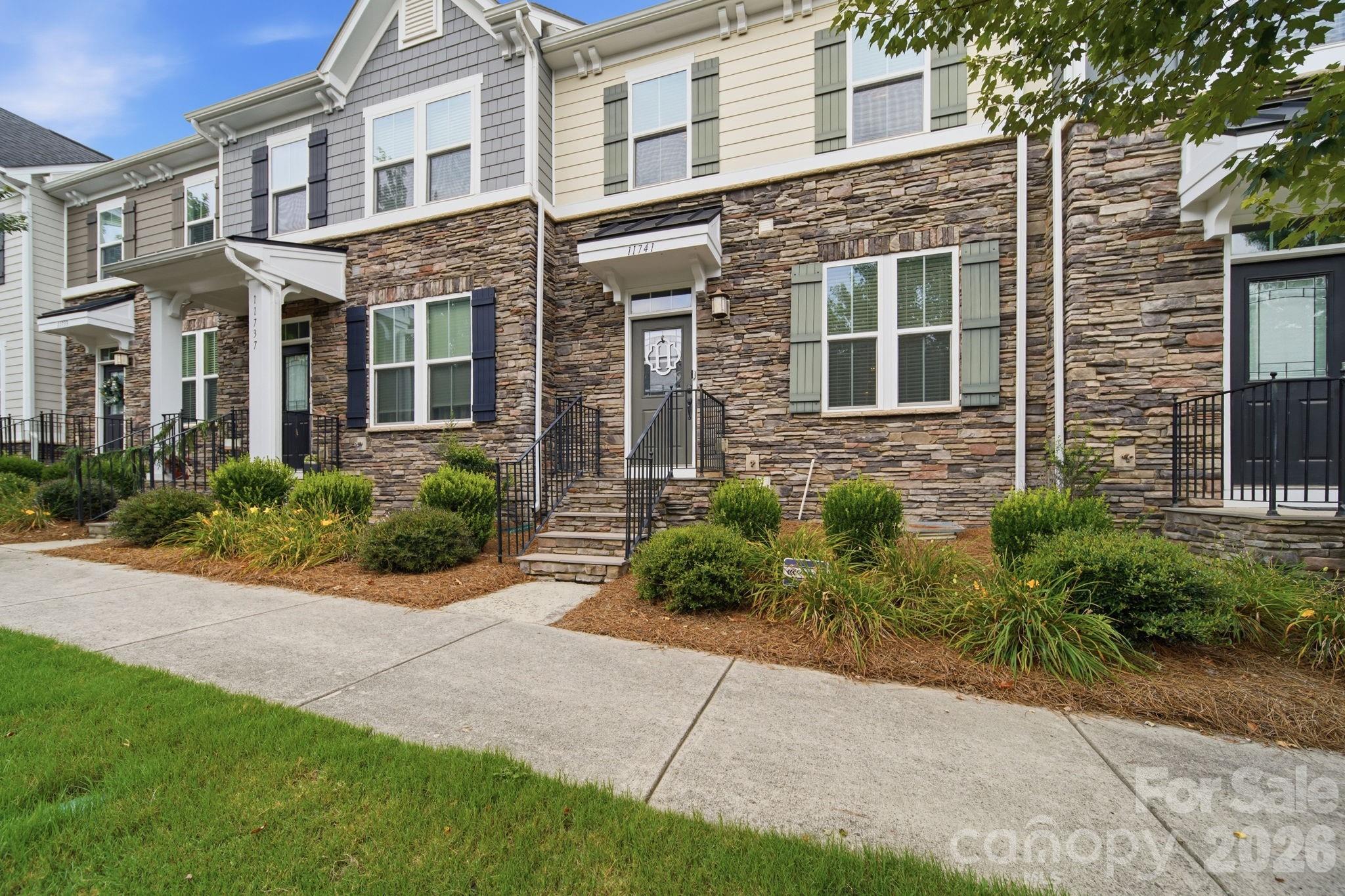 Keep your cash in your pocket! This beautiful home in the heart of Huntersville is eligible for lender specific, non-repayable, grants up to $17,500 to cover your down payment and closing costs (contact listing agent Trea Fullen for additional details). No need to wait for new construction when you can move right into this beautifully maintained, one-owner townhome built in 2018. Designed with today's lifestyle in mind, this move-in-ready home features a bright, open-concept layout that seamlessly connects the living, dining, and kitchen spaces, making it ideal for both everyday living and entertaining. The gourmet kitchen showcases white cabinetry, granite countertops, a stylish tile backsplash, stainless steel appliances, a gas range, and a large center island with sink, and a breakfast bar area with additional cabinet space. Upstairs, you'll find three comfortable bedrooms, including a spacious primary suite with a private en-suite bath. The fully finished basement adds valuable flexibility with a large bonus living area and a third full bathroom. This space is perfect for guests, a home office, workout space, media room, or playroom. Additional features, including a tankless on-demand water heater, provide modern comfort and energy efficiency. With contemporary finishes, thoughtful upgrades, and low-maintenance townhome living, and plenty of community features including an outdoor pool, this Huntersville home is ready for its next owner to move in and enjoy from day one.