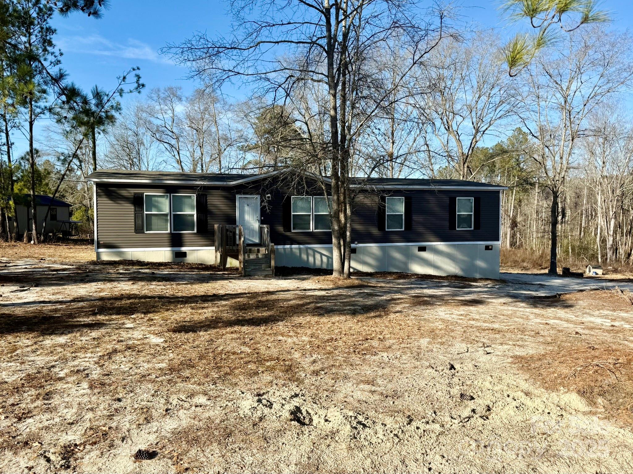 Discover the perfect blend of comfort and space with this 3-bedroom, 2-bathroom home situated on over 4 acres. This property offers plenty of room to enjoy outdoor living, whether it’s for gardening, entertaining, or just relaxing in the peaceful surroundings. Inside, you’ll find a cozy living area, a modern kitchen with a large island, and a primary bedroom with its own private bathroom. Two additional bedrooms and a second living space for a den or bonus room! 

With over 4 acres to call your own, there’s endless possibilities. Schedule a showing today to see all this property has to offer!
