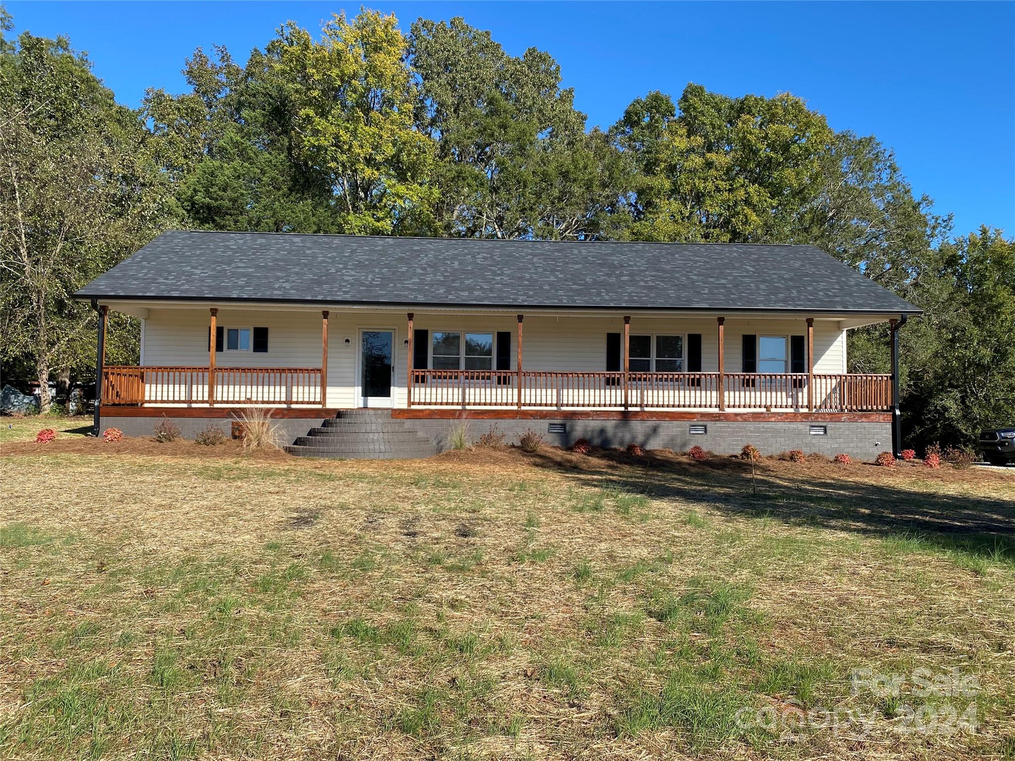 This one has all the things you'll fall in love with!  That covered front porch where many conversations and laughter where be shared as you enjoy your view and guides you into this beautifully renovated home that has so much that's new.  To name just a few as the list is long - gorgeous LVP flooring throughout, new appliances, new roof and new HVAC!  Spacious floorplan with over 1400 sq ft featuring 3 bedrooms and 2 full baths.  Your outdoor landscape is perfect for relaxation and activities with almost 3 acres and a pond!  Move this one up your list to see as it's one you don't want to let get away.