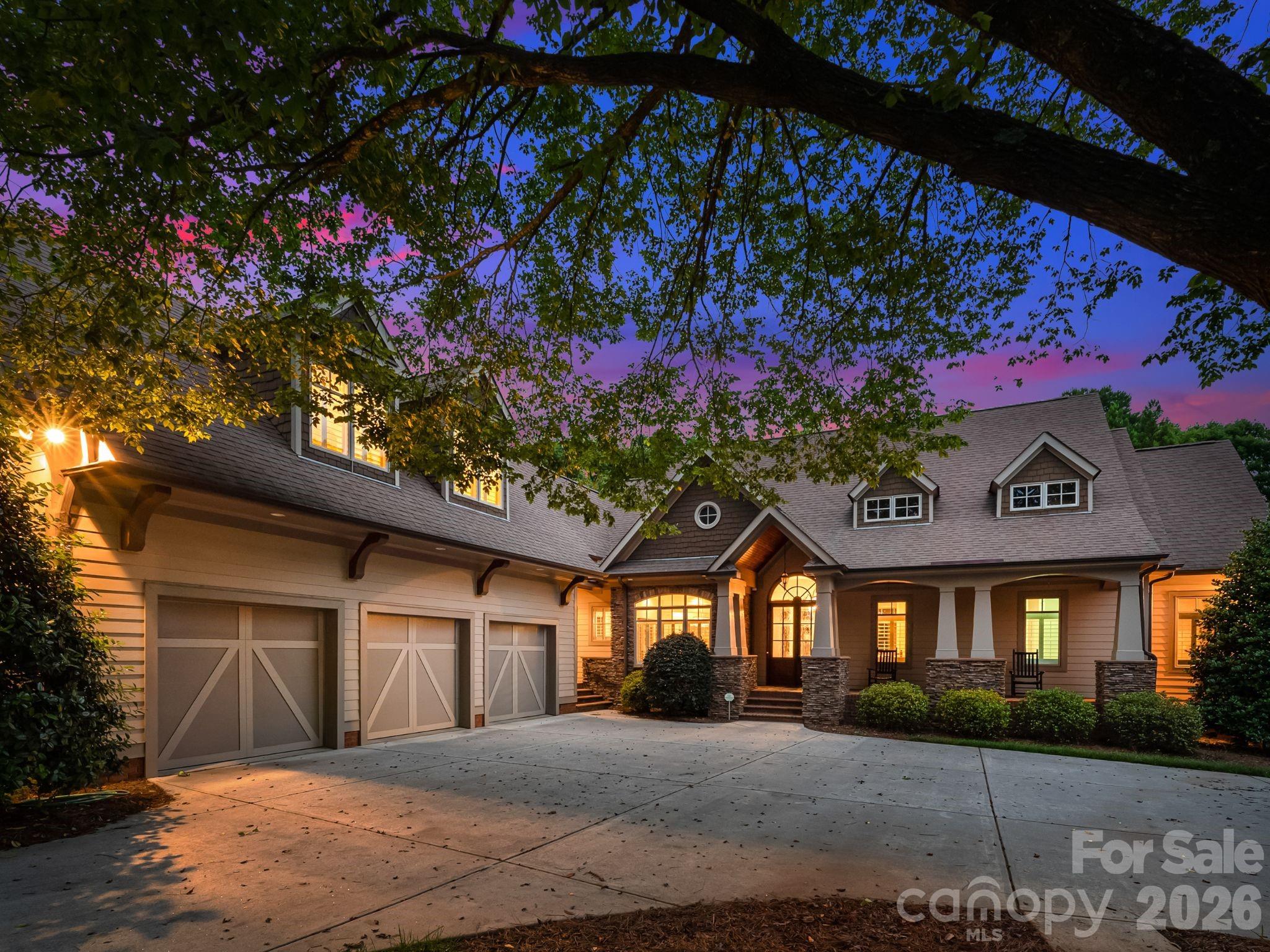 Incredible waterfront property sitting on almost .5 acres with private dock and beautiful views of Lake Norman. Great entertainers home starting with an oversized 3-car garage, circular driveway and plenty of guest parking. Charming front covered porch welcomes you to the light-filled home. Amazing views of Lake Norman as you enter this open floor plan home.  Large planning room off the garage with dog wash station.  Huge bonus/bedroom over the garage with full bath and extra storage. Primary suite on the main with large walk-in shower, dual vanities, custom closet with laundry hook-up.  Basement level has a large family room with bar, 2 guest suites each with ensuite bath, home theater, wine room, storage room, laundry room and a separate laundry for beach towels.  Tons of storage throughout this home.  Incredible outdoor oasis with private pool, hot tub, gazebo with zero entry to the water and your own private dock.  Come enjoy summer and the best of lake living!