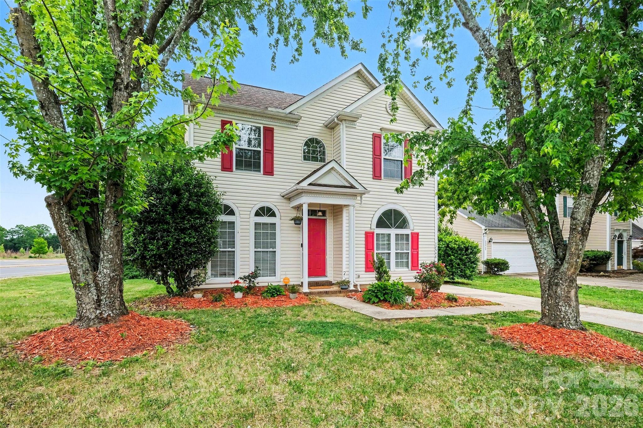 Great corner lot central to Prosperity Village, UNC, Uptown, Concord and more! Refreshed and ready for new owners, this 3 bedroom 2.5 bath home has all the great updates you want, the space you need and more! With aprx 3 yr old windows, roof and siding; all new lighting, switches, outlets, flooring, and paint throughout, this home is ready to go! Your primary bedroom is on the main level with new LVP floors and a stunning ensuite bathroom with walk-in tile shower. Two large secondary bedrooms and a loft upstairs with new carpet and another completely remodeled full bathroom. Fenced back yard with mature, low-maintenance landscaping on a large corner lot, alarm system with cameras, this home is truly move-in ready. Easy access to 485, shopping, dining, University Research Park, UNC, makes the location just as great as the house! Enjoy the character of this home, with all the new updates and low maintenance living for years to come!