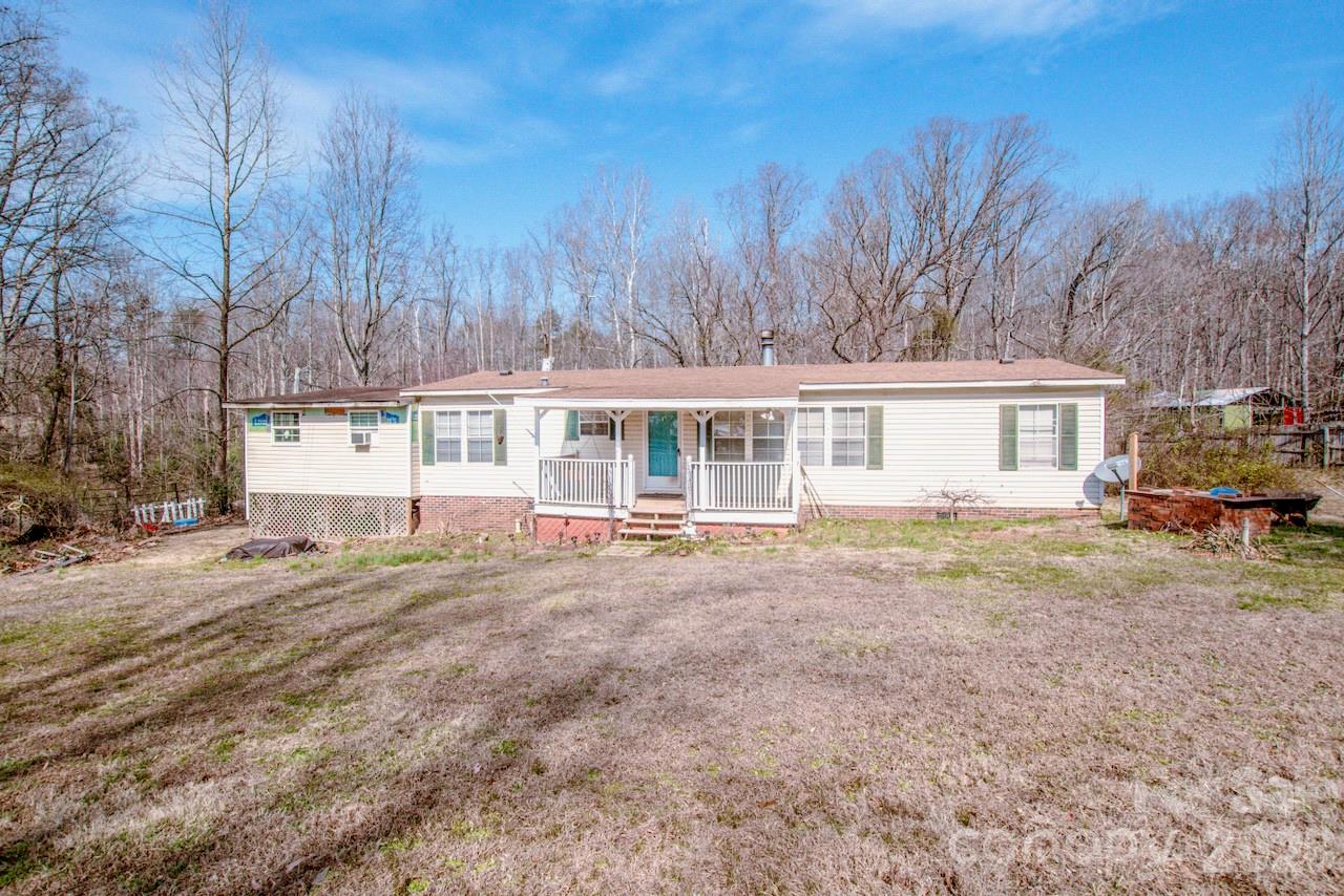 Motivated sellers offering a substantial price adjustment for an Opportunity near Love Valley! 
Welcome to your chance to own a slice of country living just minutes from Love Valley – the Cowboy Capital of the East! Situated on .55 acres, this property offers affordability, flexibility, and room to create the space you’ve been dreaming of.
This 3-bedroom, 2-bath home features:
A cozy working fireplace perfect for relaxing evenings
A fenced yard with a convenient solar-powered gate
There is  472 ft. of unfinished and unheated area.
Equestrian enthusiasts can fix up a  rear structure  for hay storage and horse shelter, making this property a great fit for enjoying the nearby horseback riding culture of Love Valley.
This home presents an excellent opportunity to create your own country retreat while staying close to local charm and outdoor adventure. Whether you are an investor or wanting something you can fix up a bit this may be your place. MLS# 4358945 is a .19 acre lot adjoining property at a very reasonable price.
Affordable. Flexible. Full of Potential. A .19 acre lot is available to purchase that adjoins this property. 
MLS# 4358945

Schedule your showing today and imagine the possibilities!