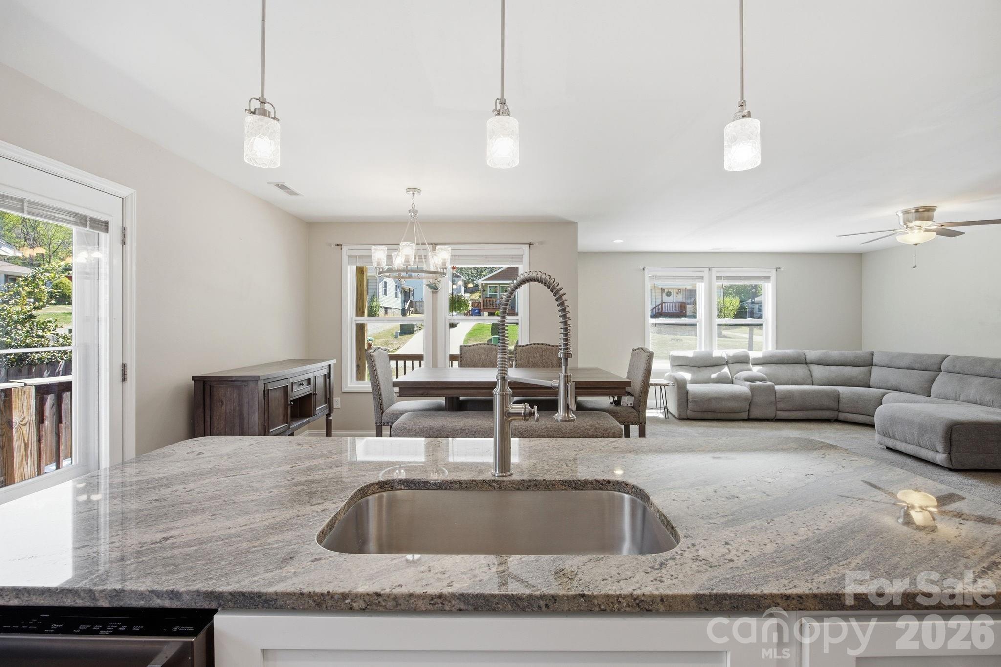 Welcome home to this beautifully maintained 3-bedroom, 2-bathroom one-level residence built in 2018, perfectly situated in the heart of Beacon Village at 9 Half Moon Drive. Designed for easy living, this modern home offers a functional layout with comfortable flow and stylish finishes throughout.
 The primary suite features a spacious bathroom with a walk-in shower, creating a relaxing private retreat. Step outside to a fully fenced backyard—ideal for pets, entertaining, or enjoying quiet evenings at home.
 Located just moments from the highly anticipated Beacon Bike Park, this property sits in a rapidly growing area that continues to attract outdoor enthusiasts and visitors year-round. Its single-level design, newer construction, and low-maintenance features make it especially appealing for short-term rentals.
 Whether you're looking to generate income through Airbnb or secure a second home with strong rental potential, this property checks the boxes. With proximity to recreation, ease of access, and broad guest appeal, it positions itself as a smart investment opportunity in an area on the rise.