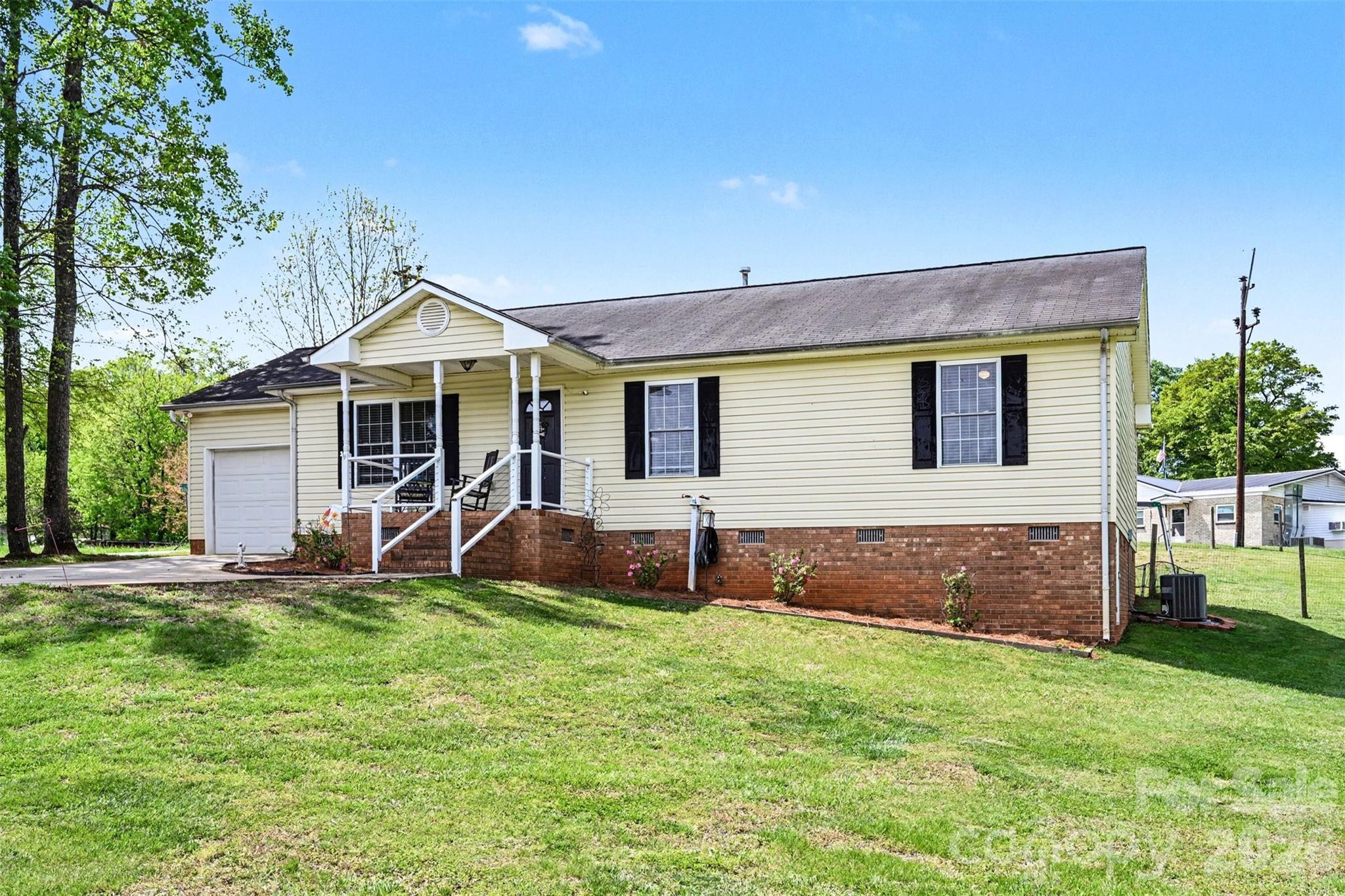 Welcome to 353 Woodlawn Ave!

This move-in ready 3-bedroom, 2-bath home offers nearly 1,300 square feet, a 1-car attached garage, and a large, fenced backyard with plenty of room to enjoy. Whether you're hosting friends, spending time outside, or simply enjoying a little extra space, this home gives you the flexibility to make it your own.

One of the best things about living here is the location. You're less than 5 minutes from downtown Mount Holly, just minutes from the future Olde Mecklenburg Brewery, under 15 minutes to downtown Belmont and the U.S. National Whitewater Center, and approximately 15 minutes from Charlotte Douglas International Airport.

Whether you're relaxing in the backyard, heading downtown for dinner, or spending the day at the Whitewater Center, you'll love having it all so close to home. Come see it for yourself.