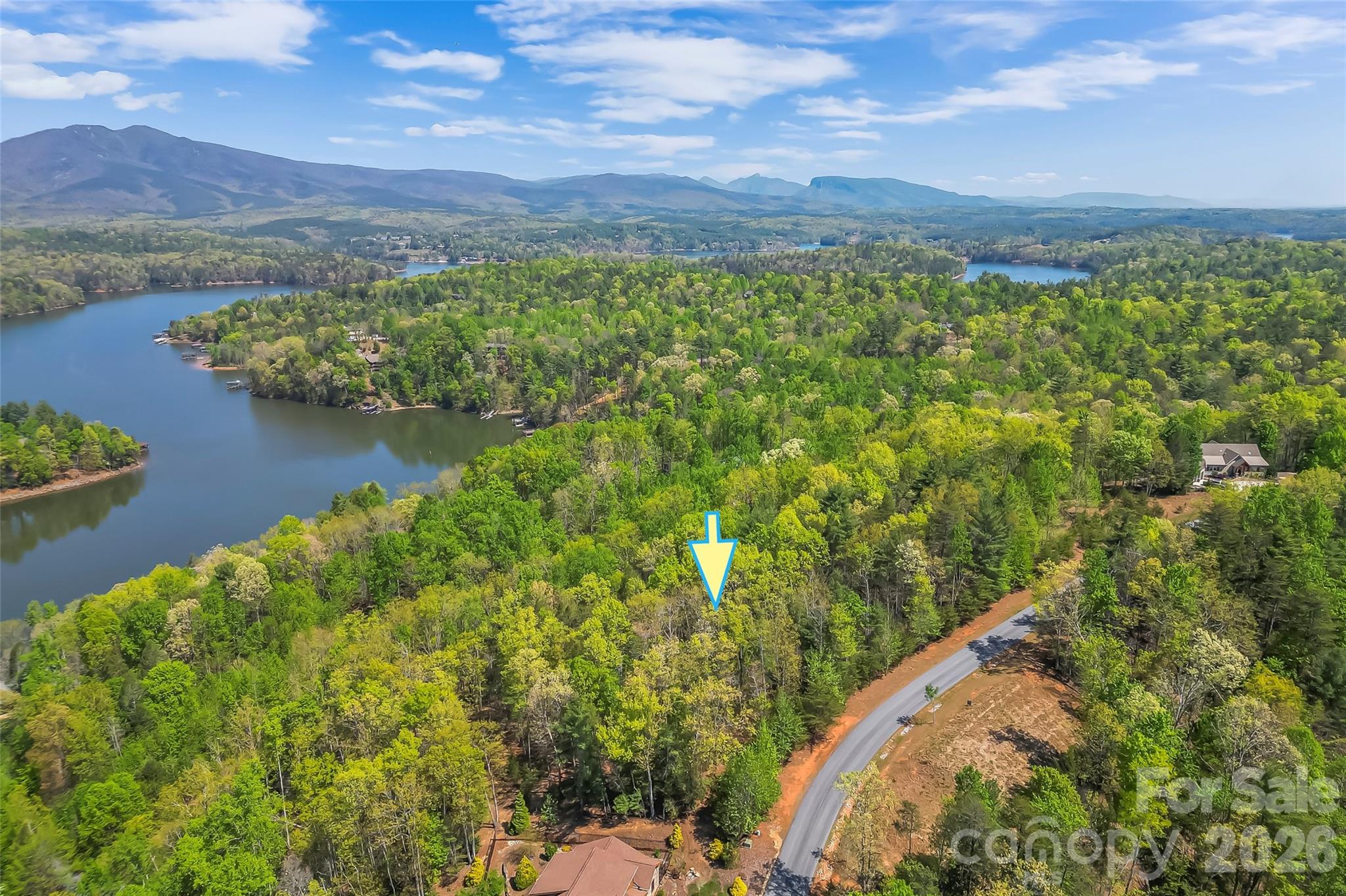 Gently sloping interior lot with winter and possible year round views of the Blue Ridge.  The Arbor is a quiet gated community just 15 minutes from Marion and in close proximity to all the outdoor activities of the Foothills. Well and septic are needed; underground power and fiber optic internet are available. Easy access to the hiking trails in the community as well a a picnic pavilion and boat storage area.  Lake James is one of the cleanest in NC and the perfect place for boating, kayaking, fishing and all water sports.  You can also choose from all the hiking and biking trails in the Pisgah NF and on the nearby Fonta Flora Trail.  Marion boast restaurants, shops and entertainment.  One hour to Asheville & 1.5 hours to Charlotte.  Community boat slip may be available for purchase