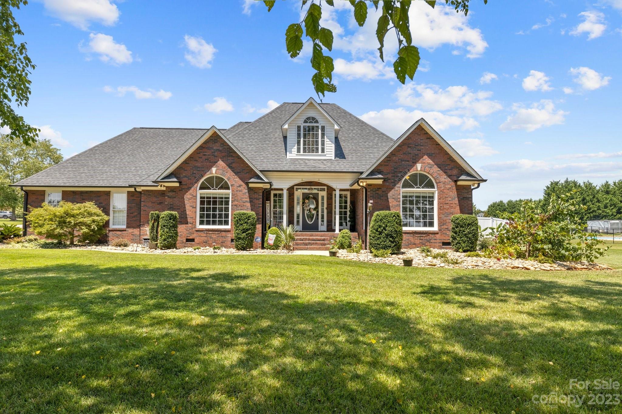 Looking for an immaculate home in a quiet, country setting convenient to everything Upstate, welcome home.  Brick home entirely upgraded, attention to every detail.  This 3/3 sits on over an acre, has mature trees shading front yard and palm trees around the pool in back yard.  Custom built-in drawers in the primary bedroom allowing more space. Noteable mention to the amazing primary bath with a custom shower equal to a body car wash, granite double vanity, makup vanity and soaker tub. The kitchen island is one solid piece of granite to entertain family and friends, or just have breakfast.  Besides new roof and HVAC, there's a custom pool house w/full bath and storage built to compliment the in-ground pool w/new liner and pump.  All new concrete with drainage around the pool and concrete circular drive w/addtional parking.  Backyard is completely fenced allowing your own private oasis. Close to Chesnee, Spartanburg and even Tryon International Equestrian Center is only 31 miles north.