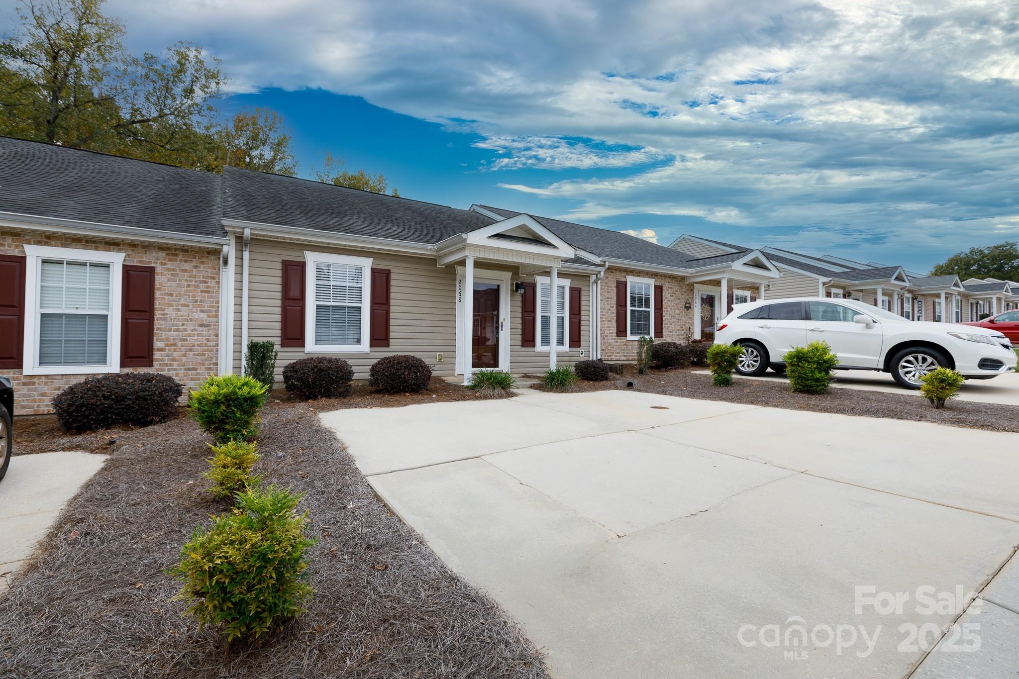 Stylish One-Level Townhome in Sought-After Cramerton Oaks, where charm and convenience meet in the heart of one of the areas most desirable communities! This beautifully maintained 2-bedroom, 2-bath townhome offers effortless one-level living just a short stroll from downtown Cramerton’s quaint shops, local cafés, and vibrant restaurants, as well as Goat Island Park with its walking trails and green spaces. You’ll love being only minutes from McAdenville, area grocery stores, hospitals, and easy interstate access for a seamless commute.



Inside, you’ll find a light-filled layout with fresh paint in the great room, kitchen, and dining areas, creating a bright, modern feel. The home features mostly solid-surface flooring, and the seller is offering a $2,000 flooring allowance to personalize the front bedroom. Step outside to a private back patio, recently updated with new stonework — the perfect spot to enjoy your morning coffee or unwind in the evening.



Additional highlights include:



Two dedicated parking spaces plus additional guest parking in the cul-de-sac
Located in a quiet, one-way-in community with minimal traffic
Low-maintenance lifestyle with single-level convenience
Water and sewer included in HOA
A rare opportunity — homes in Cramerton Oaks seldom become available!




Experience the best of small-town living with modern comforts in this move-in-ready townhome. Don’t miss your chance to call Cramerton Oaks home!