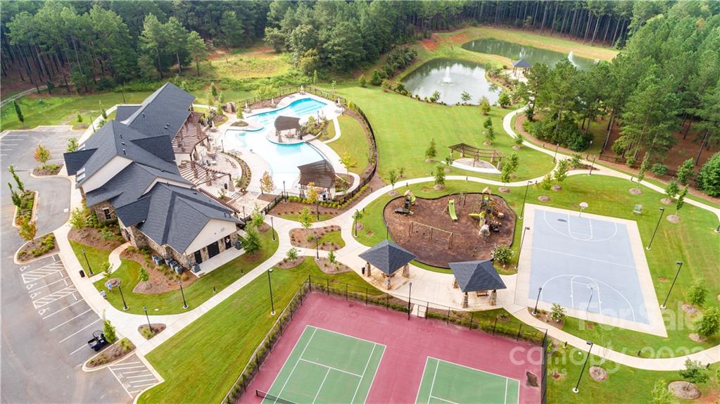 RARE opportunity to build you dream home with your own builder if you choose!!! Over an acre with lots of privacy, backs up to the nature preserve. Riverchase Estates is a stunning acreage homesite community featuring award winning amenities including a Clubhouse with fitness center, business center, a spacious swimming pool, tennis courts, basketball court, recreational areas, trails, playground and river access for kayaking & tubing. Low SC taxes and only 30 minutes from South Charlotte.