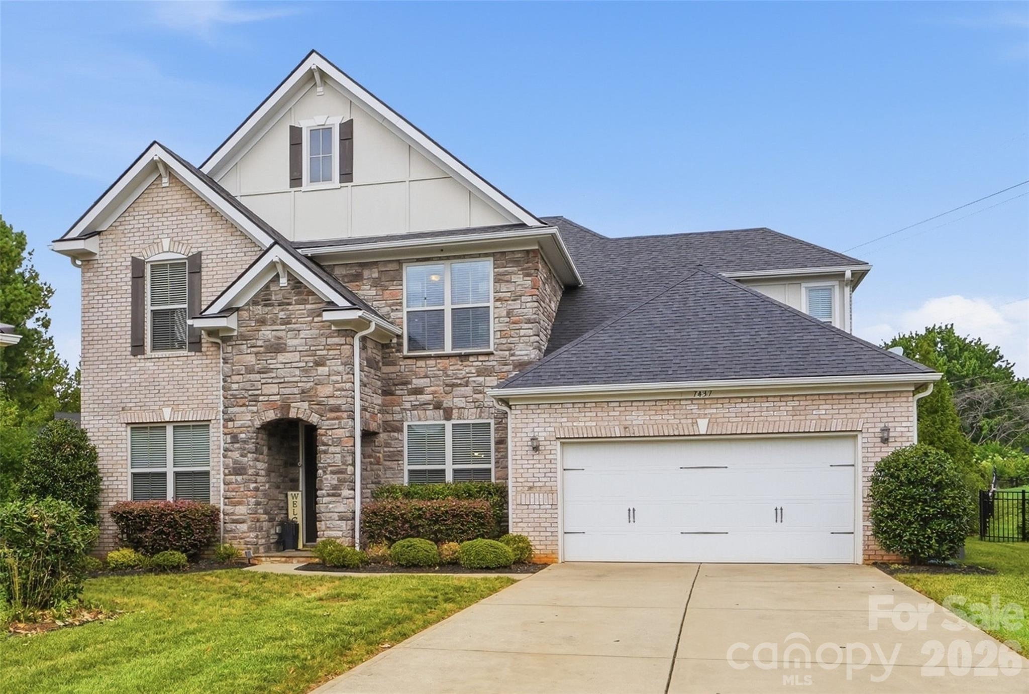 Welcome to Olde Blakeney, where elevated design, thoughtful details, and effortless entertaining come together. This bright and open 5-bedroom, 4-bath home is tucked away on a cul-de-sac and welcomes you with soaring ceilings and a beautifully designed layout. The main-level primary suite features a spa-inspired ensuite bath, custom walk-in closet, and direct access to the laundry room for everyday convenience. An additional main-level bedroom and full bath offer flexible living space. At the heart of the home, the chef's kitchen flows seamlessly into the impressive living area, creating an inviting space to gather and entertain. Upstairs, a spacious loft, additional bedrooms, and well-appointed baths offer even more space. Outside is a true entertainer's dream—covered patio with ceiling fans, heaters and a built-in outdoor kitchen complete with grill and refrigerator. Conveniently located near Blakeney Town Center and the Ballantyne area, with shopping, dining, and everyday conveniences nearby. Luxury, comfort, and convenience come beautifully together in this exceptional home.