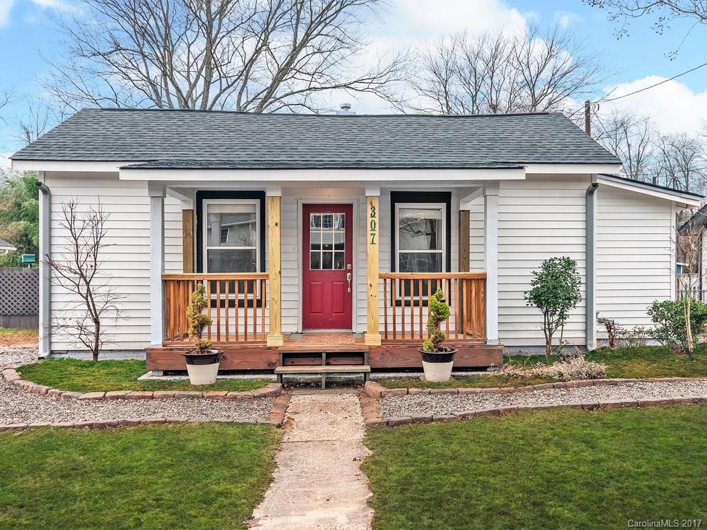 Adorable cottage completely renovated inside and out! No detail spared, brand new kitchen with granite counters, subway tile backsplash, & stainless appliances incl a double oven. Two remodeled baths en suite w/ each bedroom. Fenced backyard w/outbuilding, raised beds, kayak/canoe storage, & fire pit. In 500 yr floodplain, 0.2% risk.