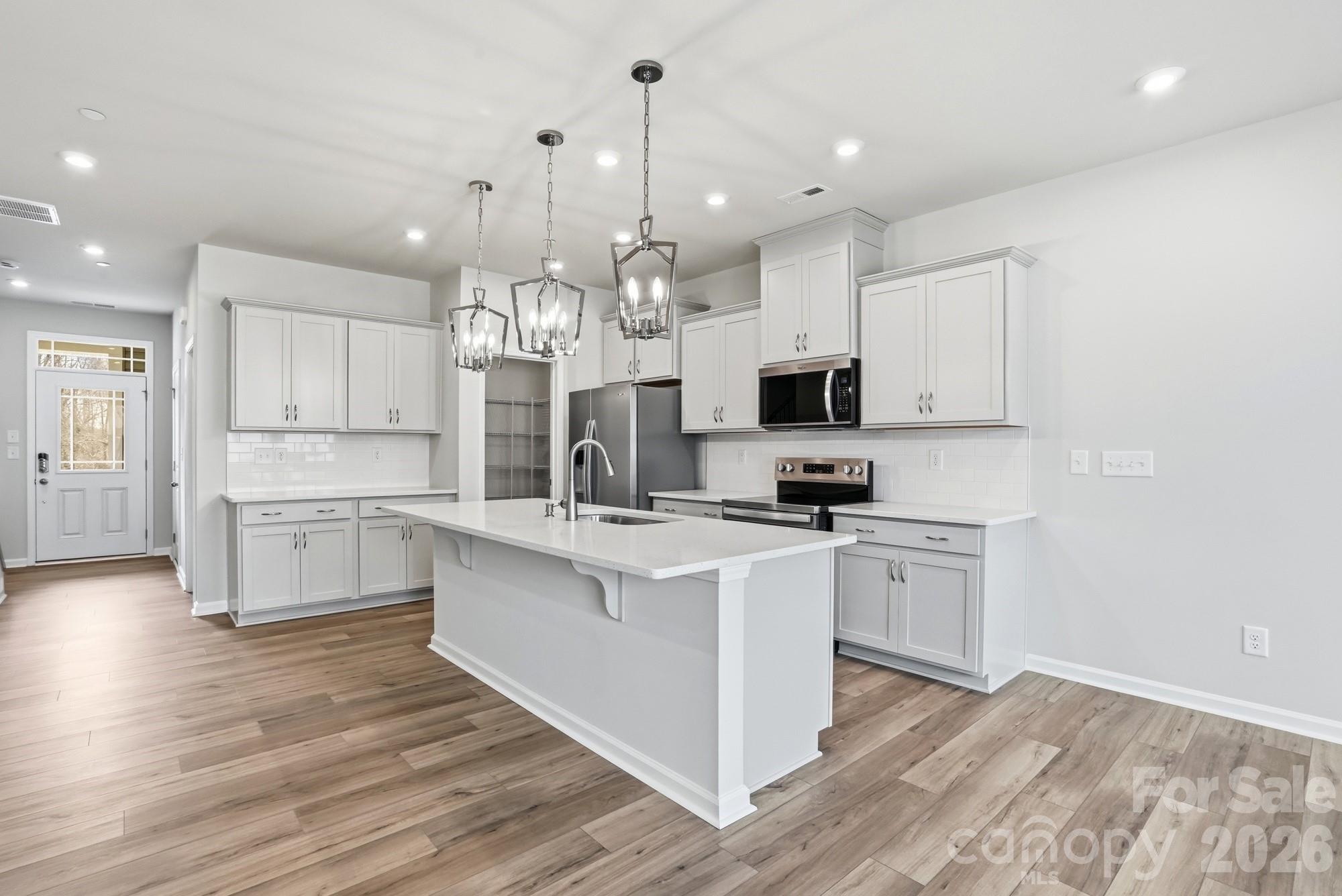Brand New Townhome...Only 7 minutes to Downtown Kannapolis & just minutes to I-85...Location, Location, Location! This popular Sierra design features 3 bedrooms; loft; 2.5 baths, and a one car attached garage. Tons of natural light enhances the open first floor. Enhanced Vinyl Plank flooring throughout first floor; gorgeous quartz countertops in kitchen and both full baths. Ask New Home Consultant about our incredible financing incentives. Will be completed and ready to close September 2026/October 2026.