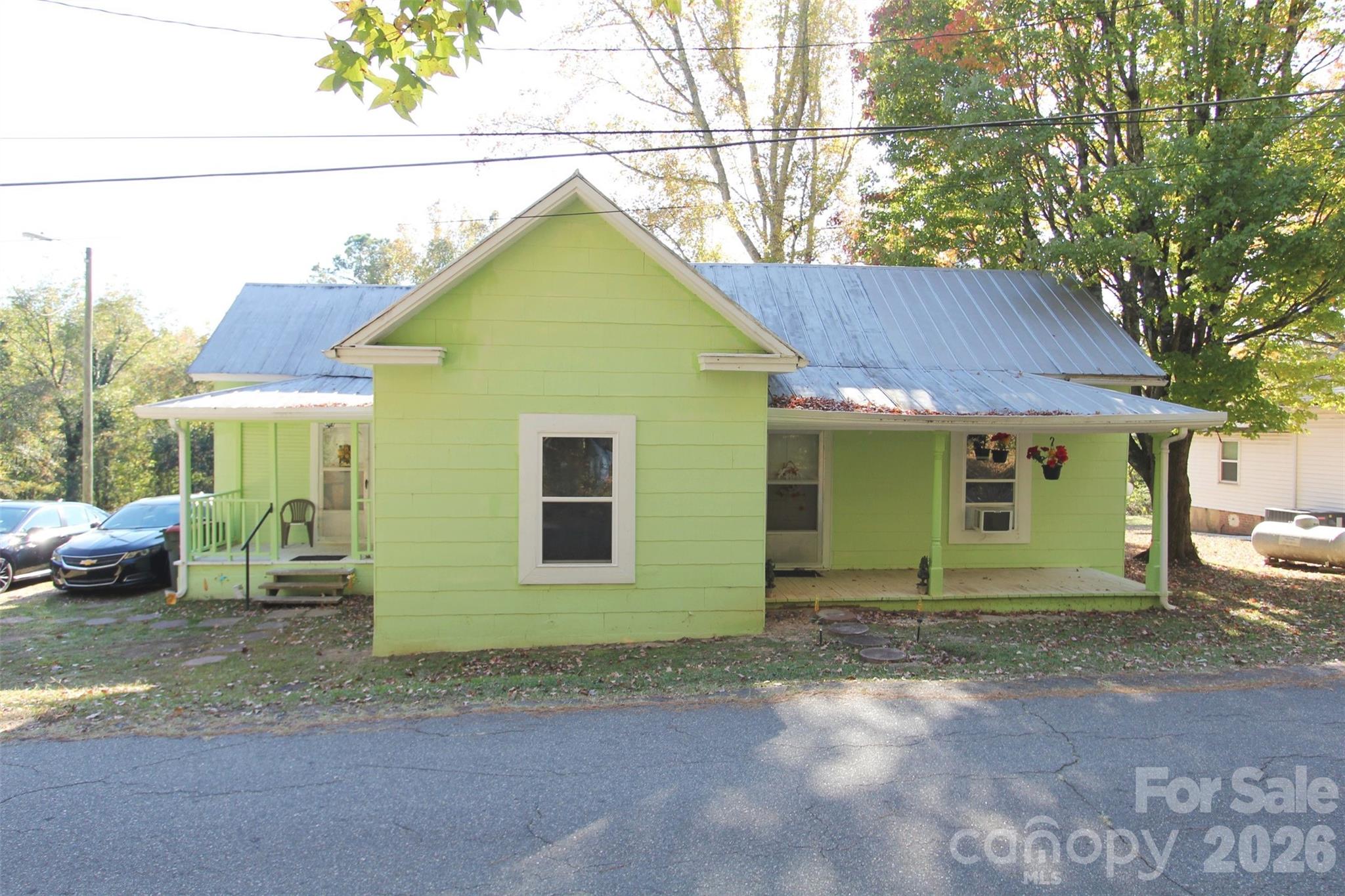 WELL MAINTAINED 1900s TWO BEDROOM, ONE BATH COTTAGE STYLE HOME, LESS THAN ONE MILE FROM SHOPPING AND DINING IN DOWNTOWN WADESBORO. This house features updated flooring & windows throughout. The bathroom includes a tub & shower combo and provides a stack washer/dryer. Updated kitchen cabinets line the wall with plenty of dining area in the kitchen. This house comes with a window Heat/AC COMBINATION unit - Just set to desired temperature for year-round comfort!