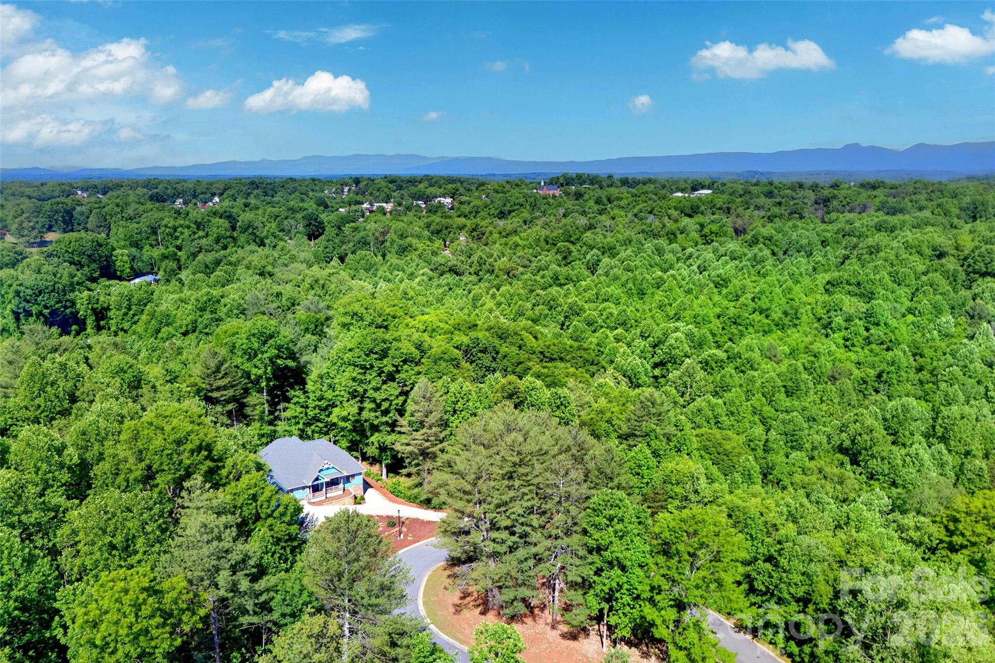 Exceptional custom 4BR/3.5BA home convenient to downtown shopping, eateries, I-40 & UNC Health Hospital. The home is well appointed on a landscaped & wooded oversized lot on a private cul-de-sac. Breathtaking entry with 13' multi-angled vaulted ceilings that flow throughout the open floorplan of the main living area. Beautiful bamboo flooring & an abundance of natural light thru-out the home leads you to a gorgeous, enclosed screened back deck for enjoying the outside with a cup of coffee or glass of wine. Spacious well thought out kitchen with tons of hardwood cabinets, multiple pullouts, quartz countertops, large center island w/prep sink, copper backsplash and all appliances included. Upper level with own int/ext entry for a guest suite or extended family with own kitchen & appliances included. A full bathroom, laundry & private step out open deck. Natural gas generator runs entire home. Dbl garage with a workshop, plenty of storage along with an unfinished basement for additional storage. Easy to show! Shown by Appt.