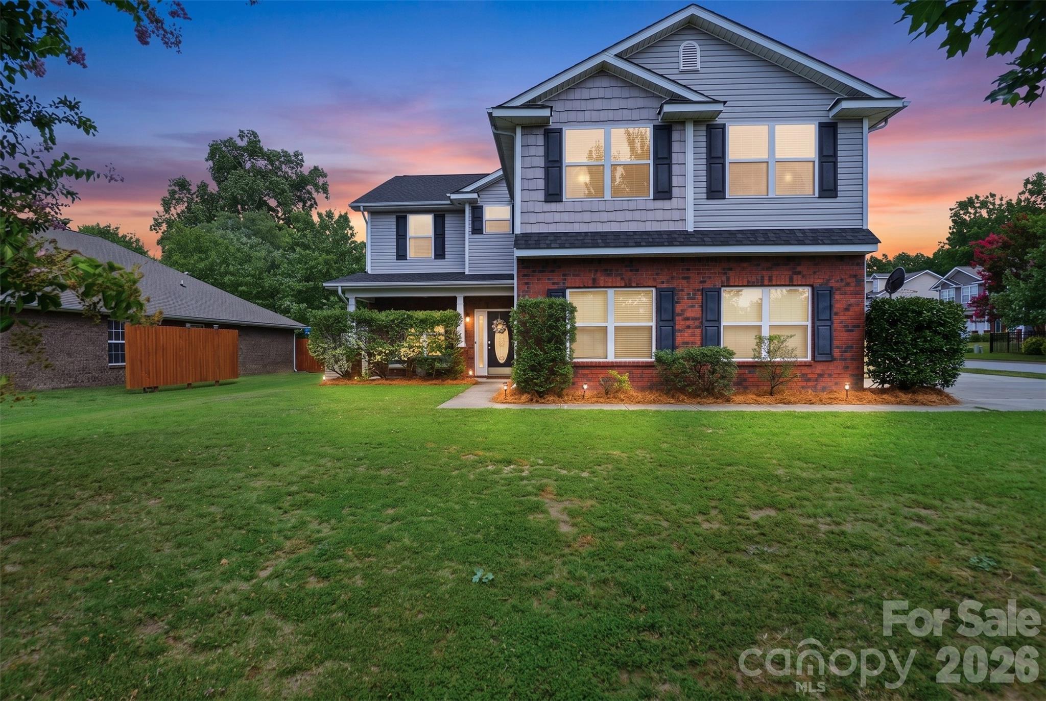 Welcome to this beautifully updated move-in-ready 5-bedroom, 3.5-bath home, where modern upgrades meet spacious, functional living. Nestled in a sought-after neighborhood near Lake Wylie and all of it's amenities, this home offers an open-concept floor plan that's perfect for everyday living and entertaining.
The heart of the home features a renovated kitchen that flows seamlessly into the dining and living areas, creating an inviting space for gathering with family and friends. The main-level primary suite is a true retreat, showcasing a stunning, newly renovated en suite bath complete with a freestanding soaking tub and a wall-mounted fireplace adding relaxing ambiance in many colors and/or warmth for chilly nights!
Upstairs, you'll find four generously sized bedrooms and a large bonus room with endless possibilities for a media room, playroom, home office, gym, or hobby space. Two bedrooms share a Jack-and-Jill bath, while the additional full bath is conveniently shared between the other 2 bedrooms and the bonus room. Every bathroom vanity upstairs has been updated with elegant white quartz countertops matching the kitchen counters and primary bath vanity.
Enjoy peace of mind knowing the major updates have already been completed, including a new roof structure and roof covering (2025), new HVAC system (2025), energy efficient windows and a replaced garage door and motor. Outside, the private, fenced backyard offers plenty of space to relax, play, or entertain, while the side-load two-car garage enhances the home's curb appeal.
Combining stylish renovations, major system updates, generous living space, and an exceptional location near the amenities of Lake Wylie, this gorgeous home is one you won't want to miss. Schedule your private showing today!