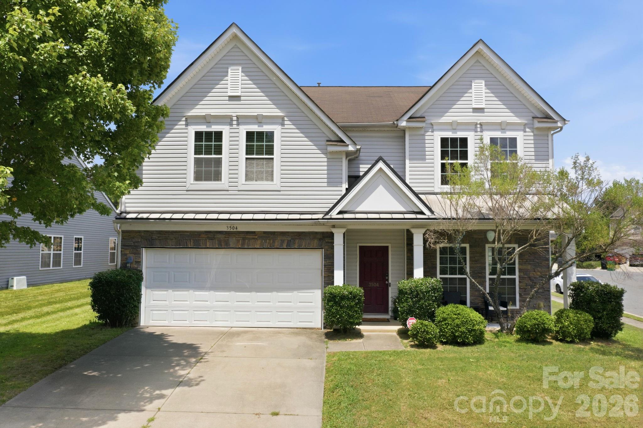 Welcome to sought-after Highland Creek, one of Charlotte's premier master-planned communities!   This  beautifully refreshed, move-in ready home features fresh paints on all walls, trim, and doors, creating a bright modern feel from the moment you enter.  Brand-new carpet has been installed throughout the home, complemented by stylish LVP flooring in selected areas.  The kitchen has been tastefully updated with beautiful new quartz countertops and a stylish tile backsplash, offering both elegance and functionality.  Step inside to a spacious and inviting floor plan where you welcomed by a generous living room and formal dining area.  Continue into the open-concept family room and kitchen, complete with a cozy breakfast area and a sunroom that provides the perfect spot to enjoy your morning coffee or relax with a book.  The thoughtful layout is ideal for both everyday living and entertaining.  Upstairs, you will find four generously sized bedrooms, two full bathrooms, and a versatile loft that can be used as a home office or living space.  This beautiful home offers not only comfort and style, but also access to an unmatched lifestyle with an abundance of neighborhood amenities.  Residents enjoy multible resort-style pools, tennis and pickeball courts, fitness center, playgrounds, parks, walking and biking trails, basketball and volleyball courts, community events, and 18-hole championship golf course.  Conveniently located near shopping, dining i-485, I-85, and Concord Mills, this home combines exceptional amenities with prime location.  Experience the best of Highland Creek living!