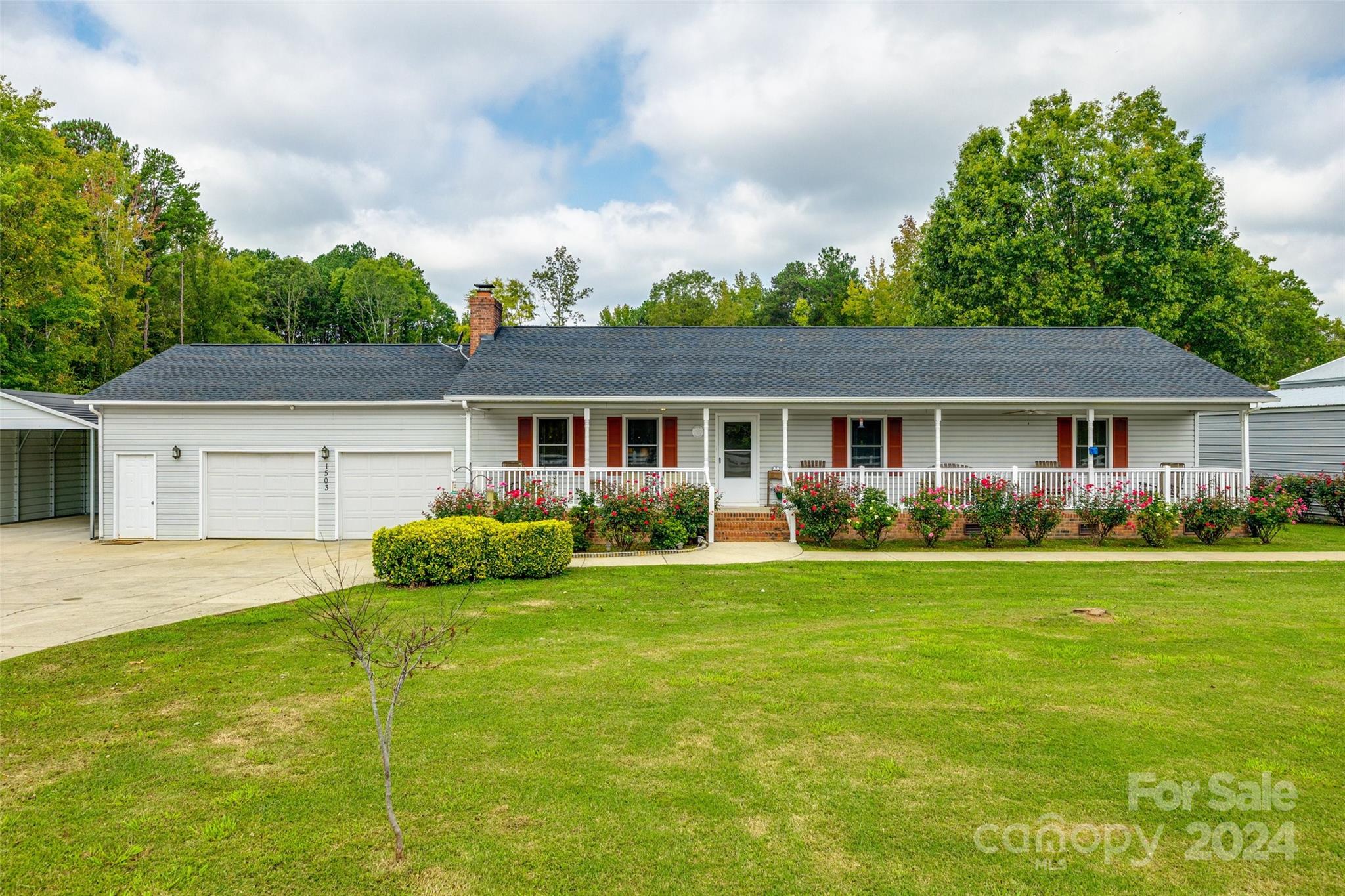 Escape to the tranquility of this charming 3-bedroom, 2-bath ranch home, nestled on a sprawling +/- 3 Acre property. Perfect for those who crave space and serenity, the home offers a seamless blend of comfort and nature. The open living and dining area is filled with natural light, creating a warm and inviting atmosphere for family gatherings or quiet evenings in. Head outside onto the screened in back porch and view the sprawling acreage. Outside, you'll discover a true slice of paradise—fruit trees that will soon be ready for harvest, perfect for the aspiring gardener or anyone who appreciates fresh, homegrown produce. Multiple sheds provide ample storage for tools, hobbies, or even a workshop. With wide open spaces and endless possibilities, this property is a rare find for those seeking a peaceful, rural lifestyle with all the conveniences of modern living.
