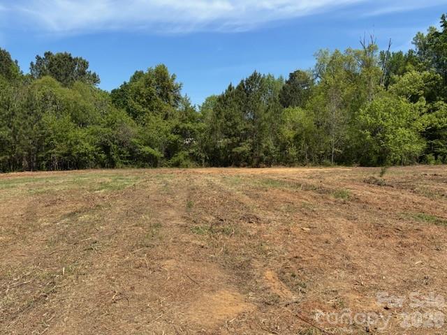 Lot 1 Ewart.  Prime Huntersville estate lot.  Bring your own builder.   Backs up to Northstone Country Club.   No HOA.   City water and sewer taps provided.  New park with walking trails, dog run and zipline planned nearby.  Convenient to Downtown Huntersville, Birkdale Village, Lake Norman, Uptown Charlotte and Charlotte-Douglas International Airport.