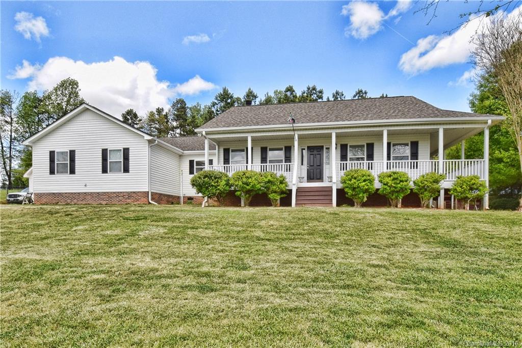 Beautiful home w/ wrap around porch on the most perfect 5 acre setting overlooking pasture, in-ground pool & amazing outdoor kitchen.Large bonus room.Spacious master suite w/ stunning vanity with dual sinks & mirrors.Fantastic storage & oversized rooms throughout.Wonderful kitchen with abundant cabinetry & breakfast nook.Outdoor entertaining area including firepit.Detached 2 car garage. Peaceful, gorgeous equestrian living w/ the convenience of Lake Wylie, Clover, Belmont and Charlotte close by.