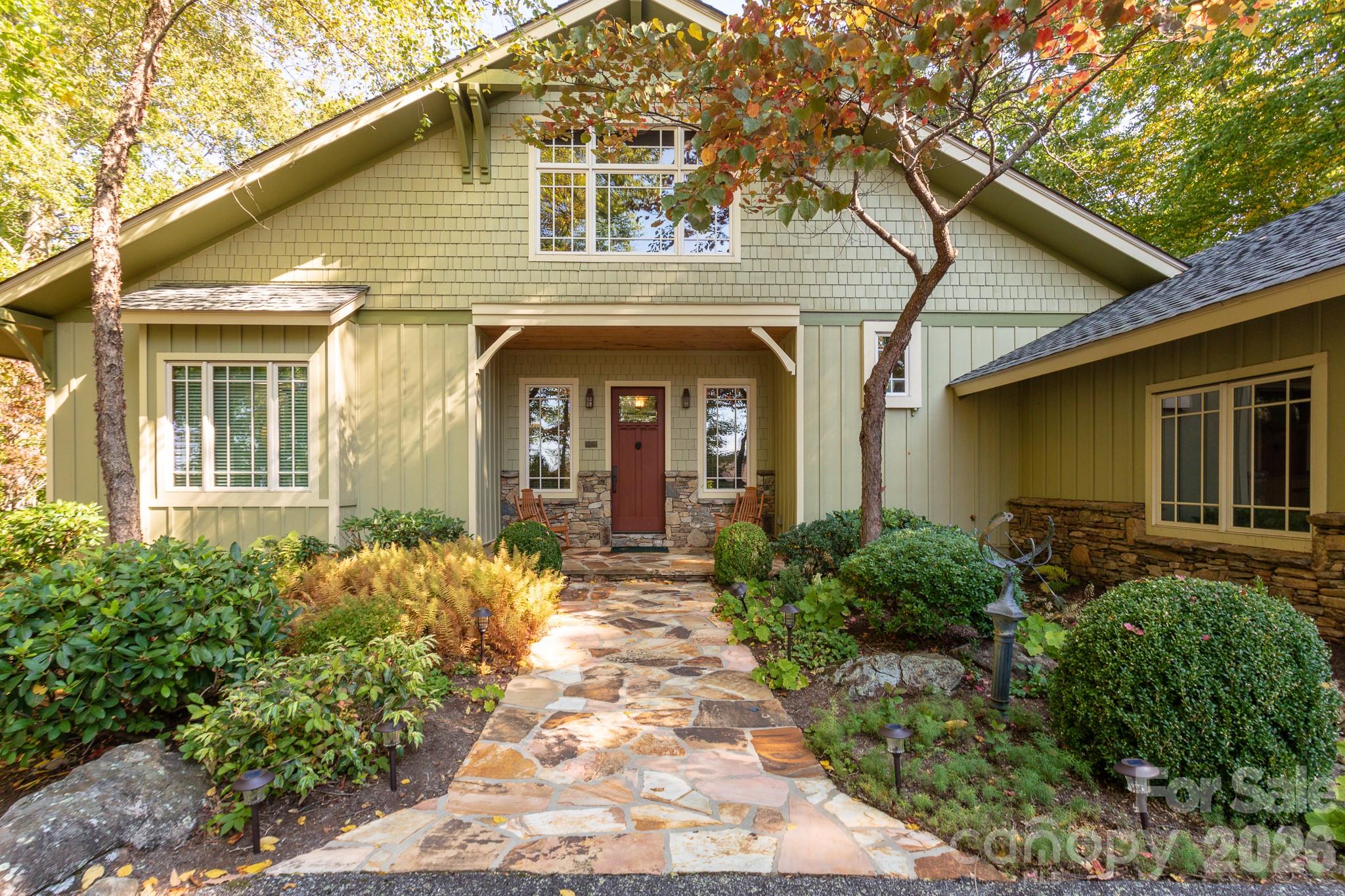 This beautiful MOUNTAIN AIR home has lush, golf course views & multi-level decks with lots of room for family & guests. The great Room features soaring pine ceilings with stone fireplace, hardwood floors, built-ins, & a view from the loft above which can be additional living, study, or office. The well-appointed, spacious Chef's kitchen & large dining room are perfect for family gatherings & entertaining, with access to covered, screened porch. 3+ generous bedrooms with 3.5 baths. Lower level family/game room has another stone fireplace & opens to a large, covered deck. This home features a temperature-controlled wine room, complete with tasting area! 2-car garage with extra room for golf carts. Whole-home dehumidifier & surge protector. Enjoy cool summer temperatures at MOUNTAIN AIR & many activities & club amenities (available with separate membership), golf, tennis, fitness, dining, spa, hiking, nature center, pickleball & FABULOUS mountain views! INCLUDES FURNISHINGS & 2 GOLF CARTS. Seller may be willing to pay $30,000 toward the Buyer's initiation fee of the social membership to MACC at closing, with an acceptable offer, and the buyer would need to make an application to the club prior to closing.
