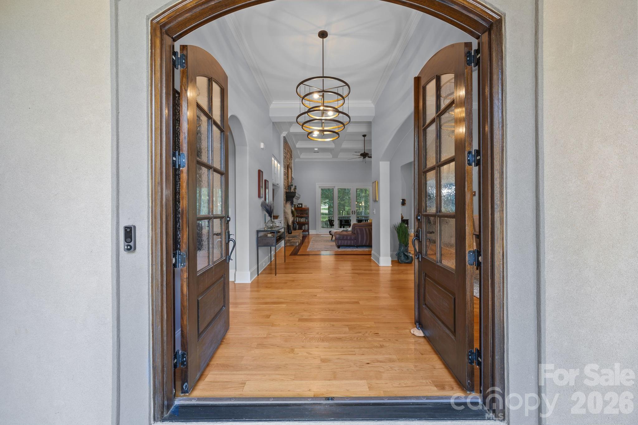 Exceptional Davidson Retreat with over 6,100 sq. ft. of Refined Living including a Heated Pool!
Discover timeless craftsmanship and modern luxury in this stunning 5-bedroom home just minutes from Davidson College and Lake Norman. Set on a naturally contoured lot offering privacy and curb appeal, this residence features soaring ceilings, expansive windows, and open living spaces filled with light. The chef’s kitchen flows into a spacious great room and covered outdoor living area—perfect for entertaining. The primary suite is a serene retreat with a spa-inspired bath and custom closets. Fully complete basement with it's own entrance serves as a separate living quarters for extended family, or possible rental income opportunity.  Terraced landscaping and mature trees enhance the property’s character, creating a peaceful, elevated setting. Impeccably maintained and move-in ready—every detail reflects quality and care.  Washer/dryer set on the basement level will remain.
