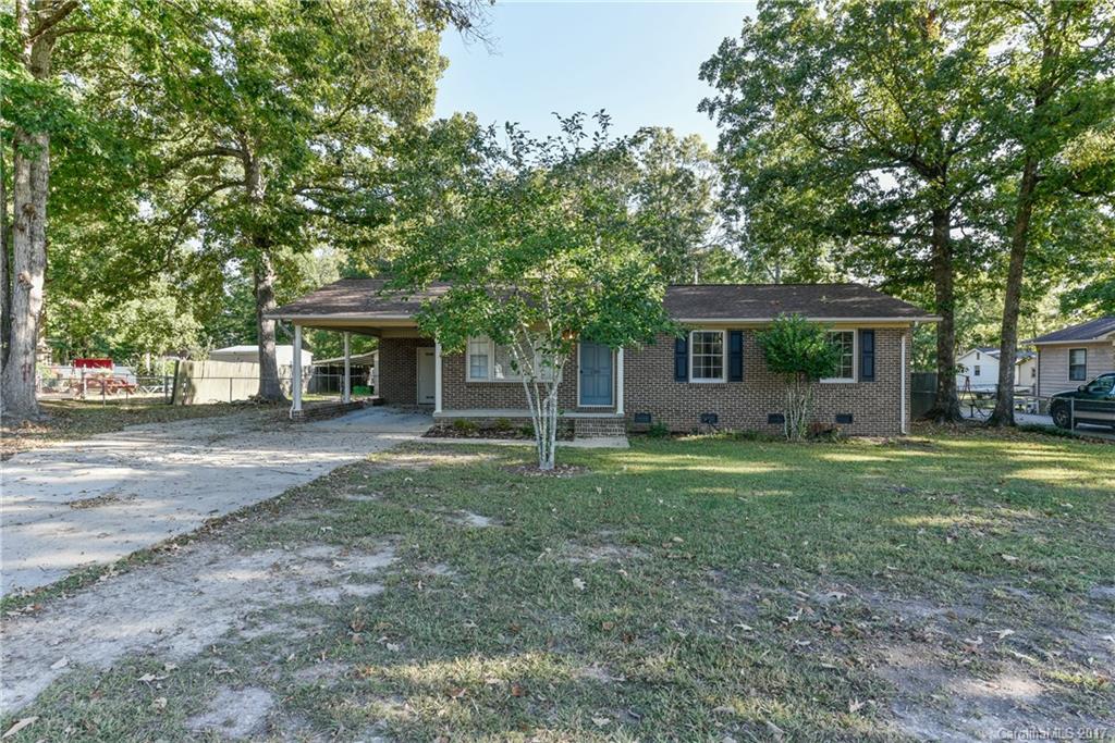 Great home!  Kitchen has been completely redone in updated tones with new granite, metallic backsplash, fresh paint and new appliances.  Home features a den that flows to a screened patio; great for relaxing or entertaining.  Fresh paint and flooring throughout.  This home also features a 2 bay, wired, detached garage/workshop with tons of storage.  Nice level lot with plenty of trees for privacy.  Call now on this cute as can be home!