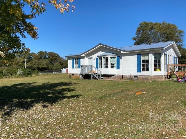 This beautiful home sits on over an acre on a quiet street in Concord.  Very well kept home, ready to move in! 3 spacious bedrooms and 2 full bathroom offer plenty of room.  Kitchen opens up to large great room. This home is move-in ready and will not last long!