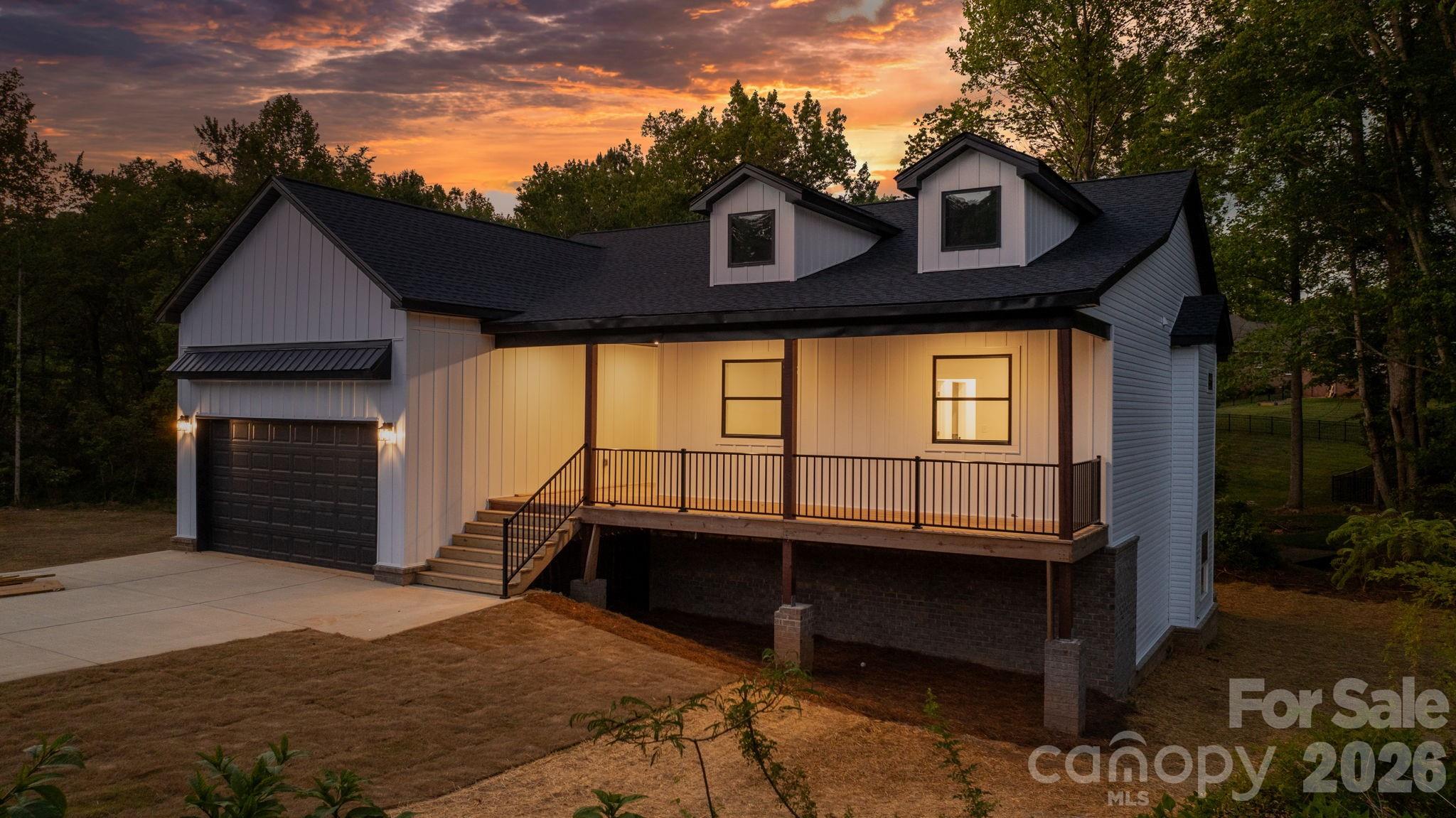 Tucked into a cup-de-sac welcome to this beautifully crafted 3-bedroom, 2-bath home by Catana Homes near lake Hickory! Offering 2,201 square feet on over a half-acre lot in the desirable Wittenburg Springs community of Taylorsville. Just 5 minutes from the Hickory city limits and 15 minutes to downtown Hickory, this location offers the quiet of a slightly-outside-the-city setting with everyday conveniences close at hand and no city taxes.

True main-level living at its best, all three bedrooms and both bathrooms are conveniently located on the main floor, complemented by modern finishes and quartz countertops throughout. Relax and unwind on the inviting front porch, or enjoy seamless indoor-outdoor living from the back deck off the main level. Downstairs, the walk-out basement offers a finished flex space, perfect for a home office, playroom, or den,  along with additional unfinished area ready to be customized into a media room, home gym, or extra living space. Step out from the basement onto the back patio that opens directly to the yard.

A 2-car garage, city water and sewer, and a generous backyard with plenty of room to fence in for your furry companions round out the everyday livability. Outdoor enthusiasts will love being less than 10 minutes from the Wittenburg Springs Boating Access on Lake Hickory.

Offered at $485,000. Private showings available next week, reach out today to secure your appointment.