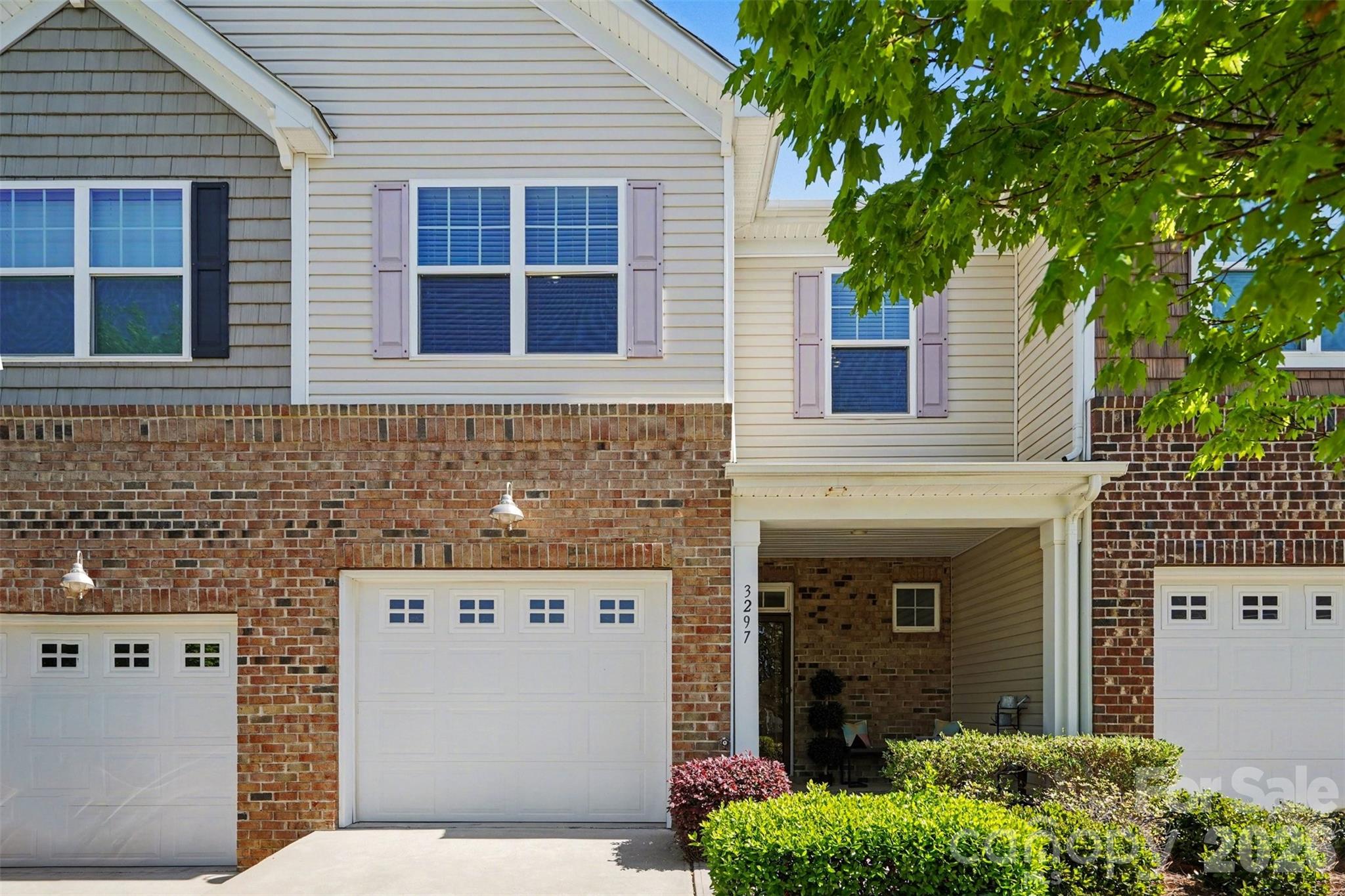 This beautifully maintained townhome in Kinmere Commons offers the perfect blend of comfort, style, and low-maintenance living in one of Gastonia’s most convenient locations. From the moment you arrive, the welcoming covered front porch and classic brick-accented exterior set the tone for what’s inside.
Step through the front door into a bright, inviting interior where an open-concept layout creates an easy flow between the main living spaces. Natural light fills the living room, highlighted by a cozy fireplace that anchors the space and makes it ideal for relaxing evenings or gathering with friends. The adjoining dining area connects seamlessly to the kitchen, where rich cabinetry, ample counter space, and a breakfast bar make both everyday living and entertaining effortless. Just beyond, a private rear patio offers a quiet spot to enjoy your morning coffee or unwind at the end of the day.
Upstairs, the spacious primary suite provides a true retreat, complete with an updated bathroom featuring a sleek dual vanity, modern finishes, a separate glass-enclosed shower, and a freestanding soaking tub that creates a spa-like feel. Additional bedrooms offer flexibility for guests, a home office, or hobbies, while the upper-level laundry adds everyday convenience.
The Kinmere Commons community enhances the lifestyle with amenities designed for both relaxation and recreation, including a neighborhood pool, clubhouse, playground, and sidewalks that encourage evening strolls and connection with neighbors. 
Located just minutes from shopping, dining, and major commuter routes, this home also offers easy access to everything Gastonia and the greater Charlotte area have to offer. Whether you’re heading into the city or enjoying nearby parks and local conveniences, this location balances accessibility with a peaceful neighborhood setting.
This is an opportunity to enjoy comfortable living with thoughtful updates in a community that truly feels like home.